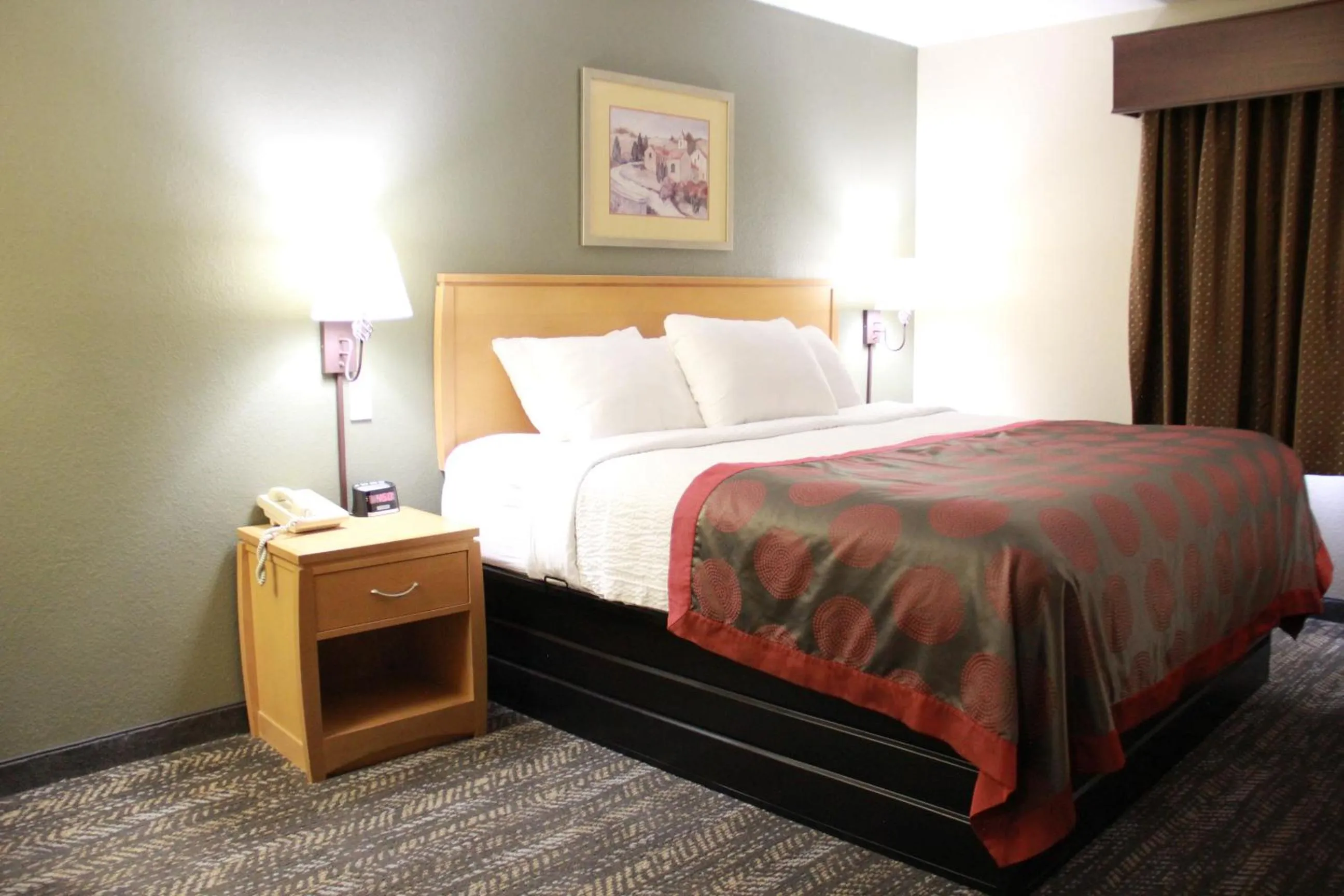 Bed in Ramada by Wyndham Spirit Lake/Okoboji
