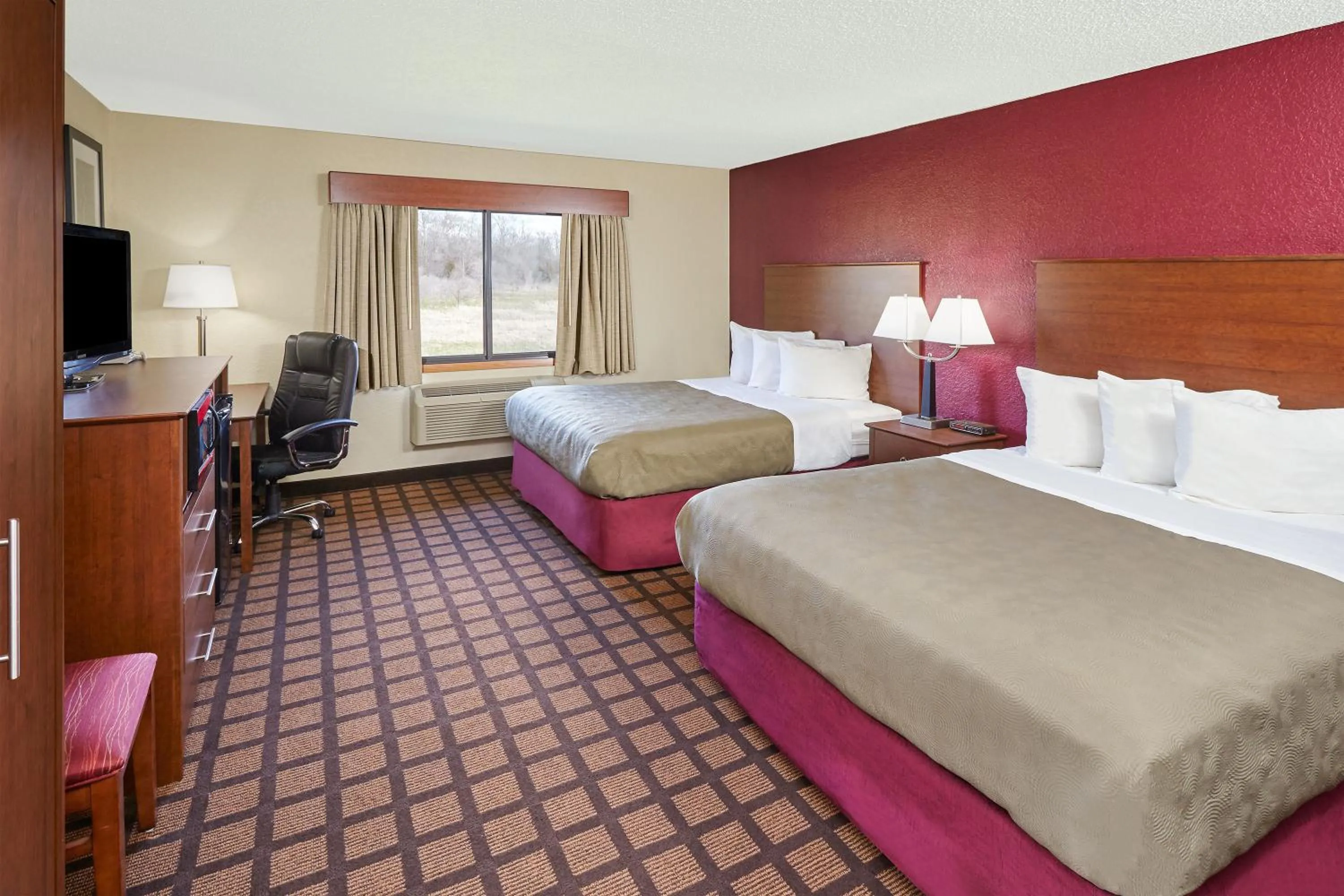 Photo of the whole room, Bed in AmericInn by Wyndham Burlington