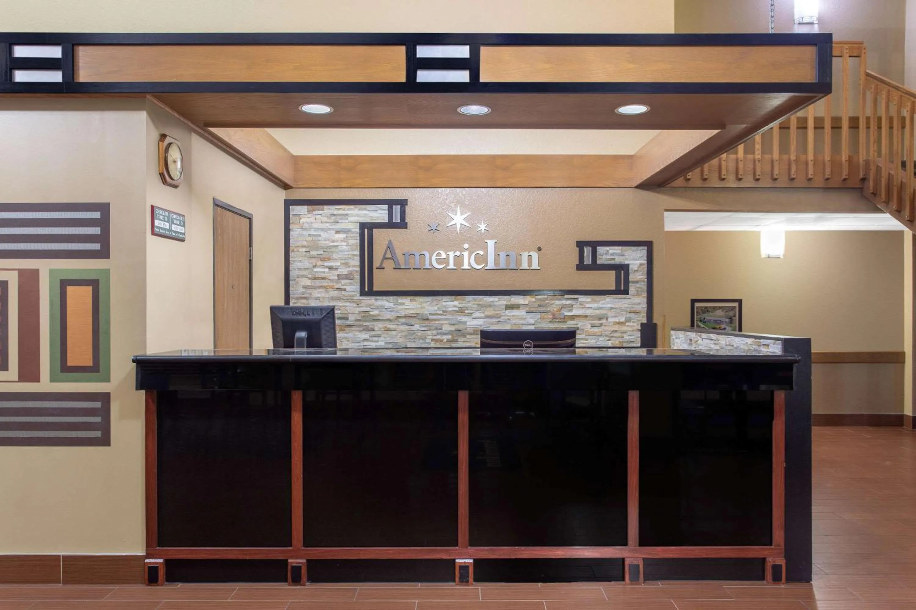 Lobby or reception in AmericInn by Wyndham Burlington