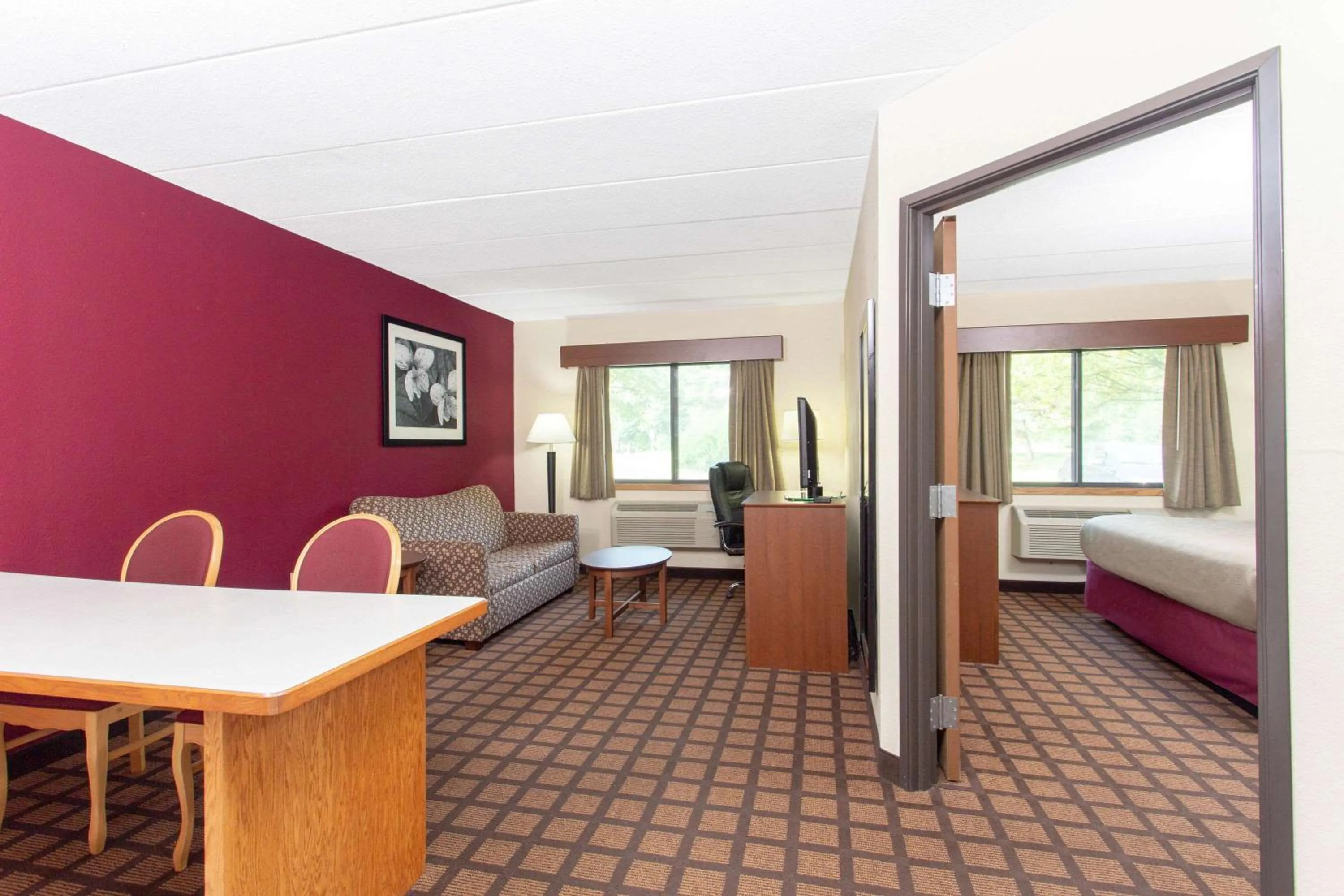 Photo of the whole room, Bed in AmericInn by Wyndham Burlington