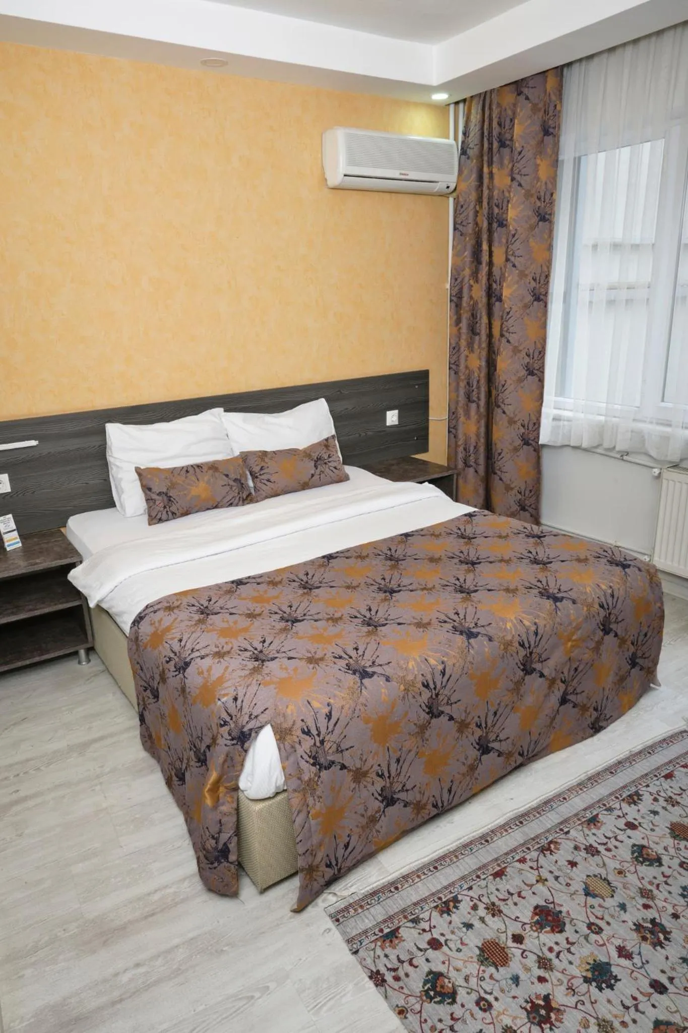 air conditioner, Bed in The Breeze Hotel