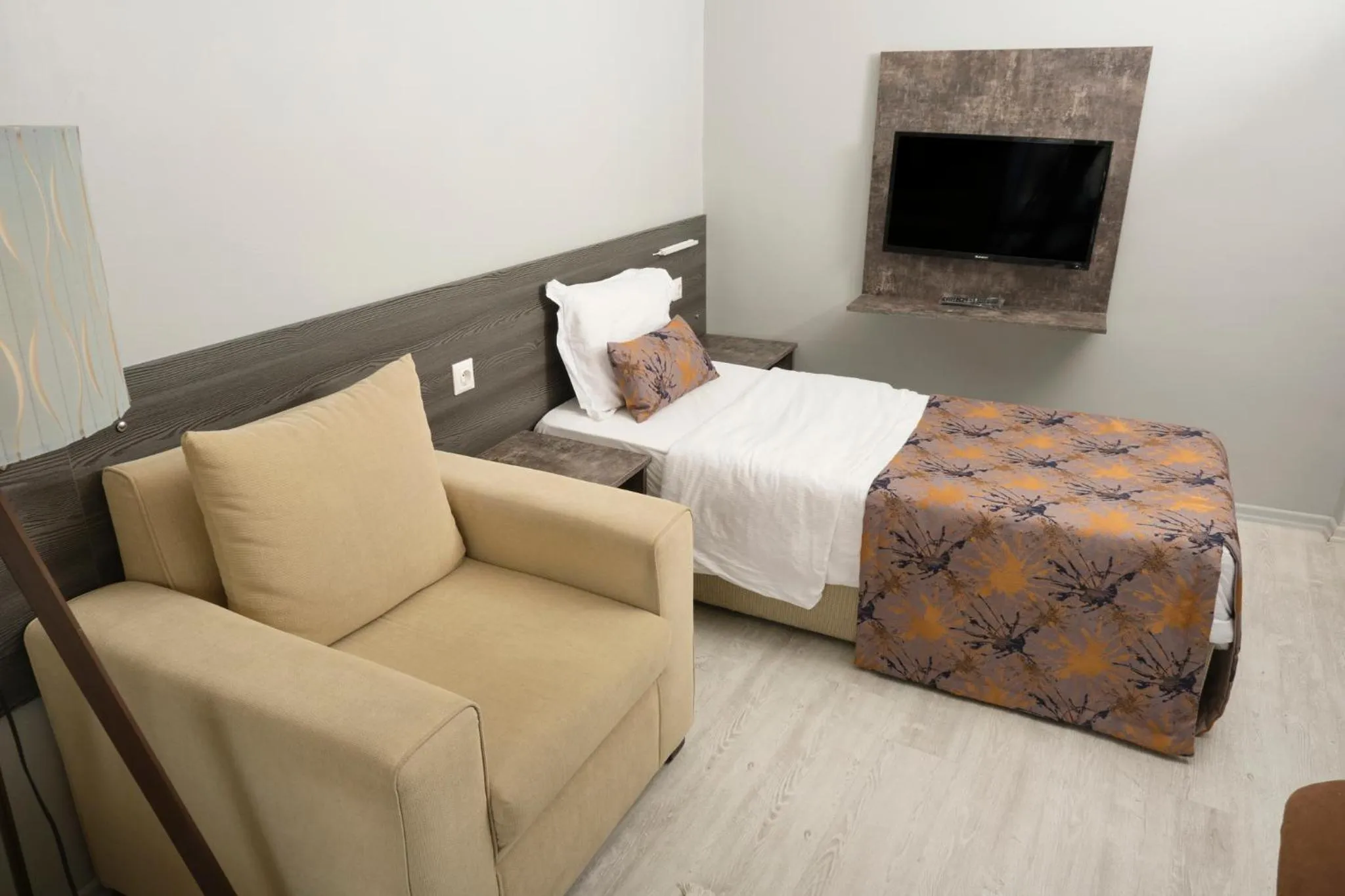 Text overlay, Bed in The Breeze Hotel