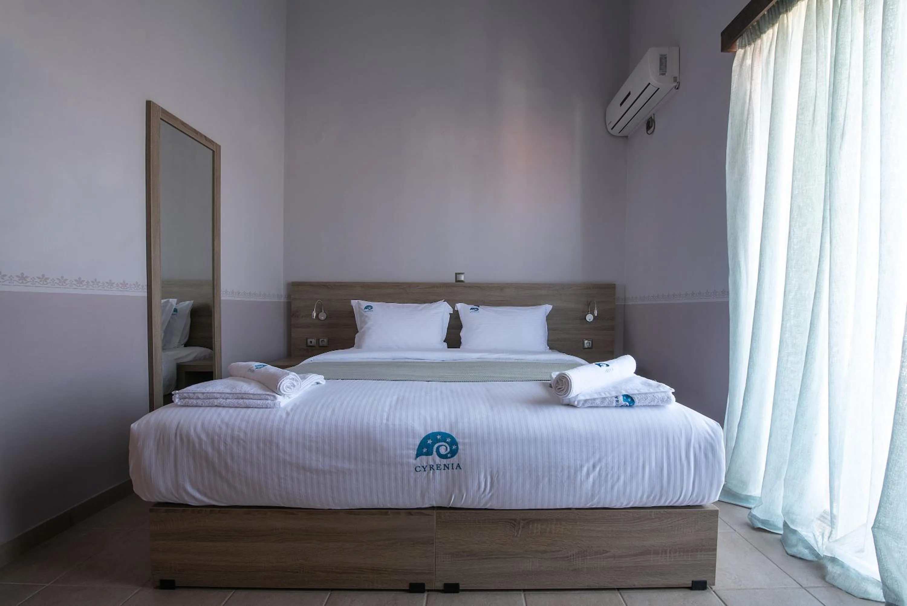 Bed in Cyrenia Guesthouse