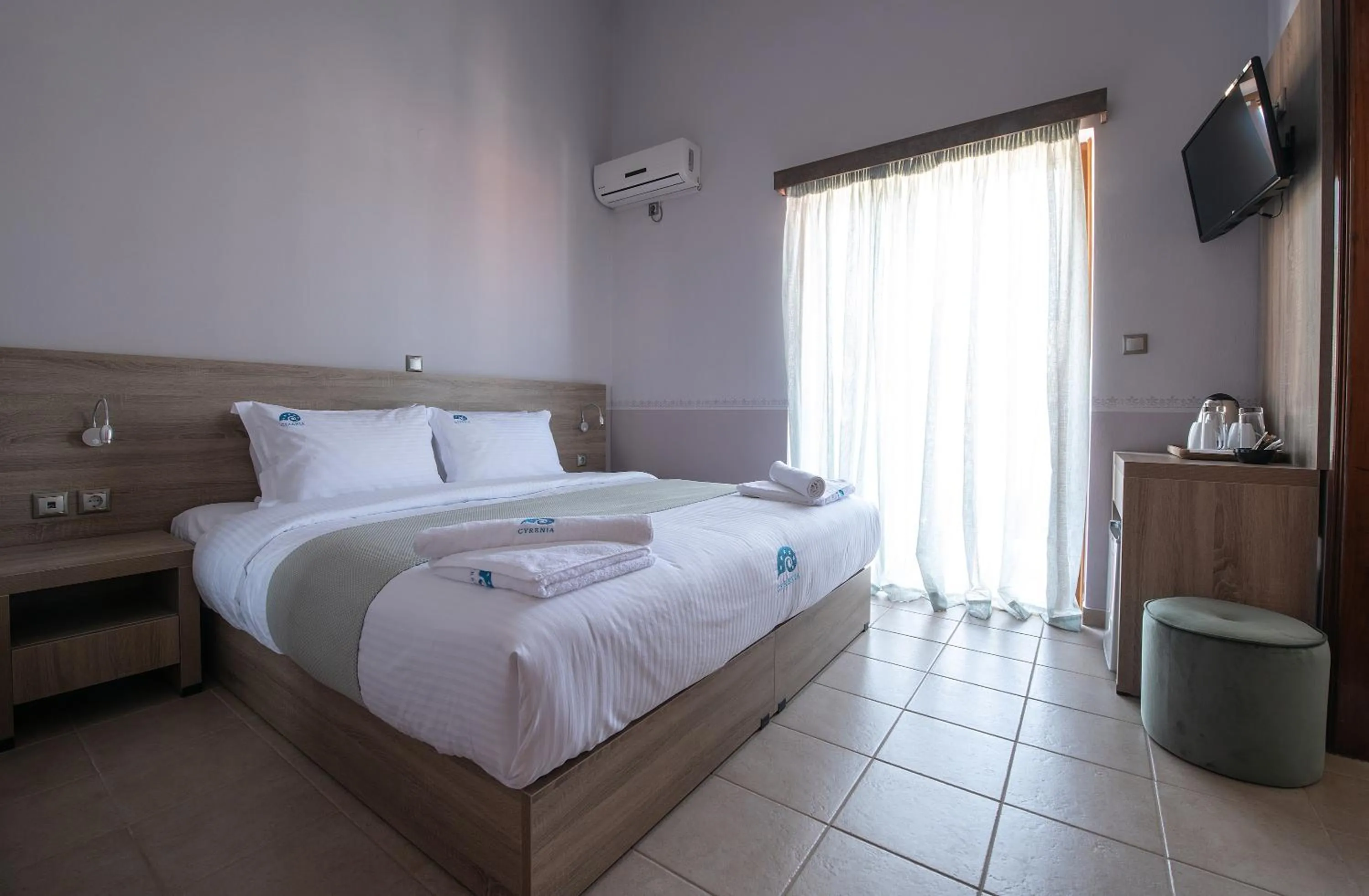 Bed in Cyrenia Guesthouse