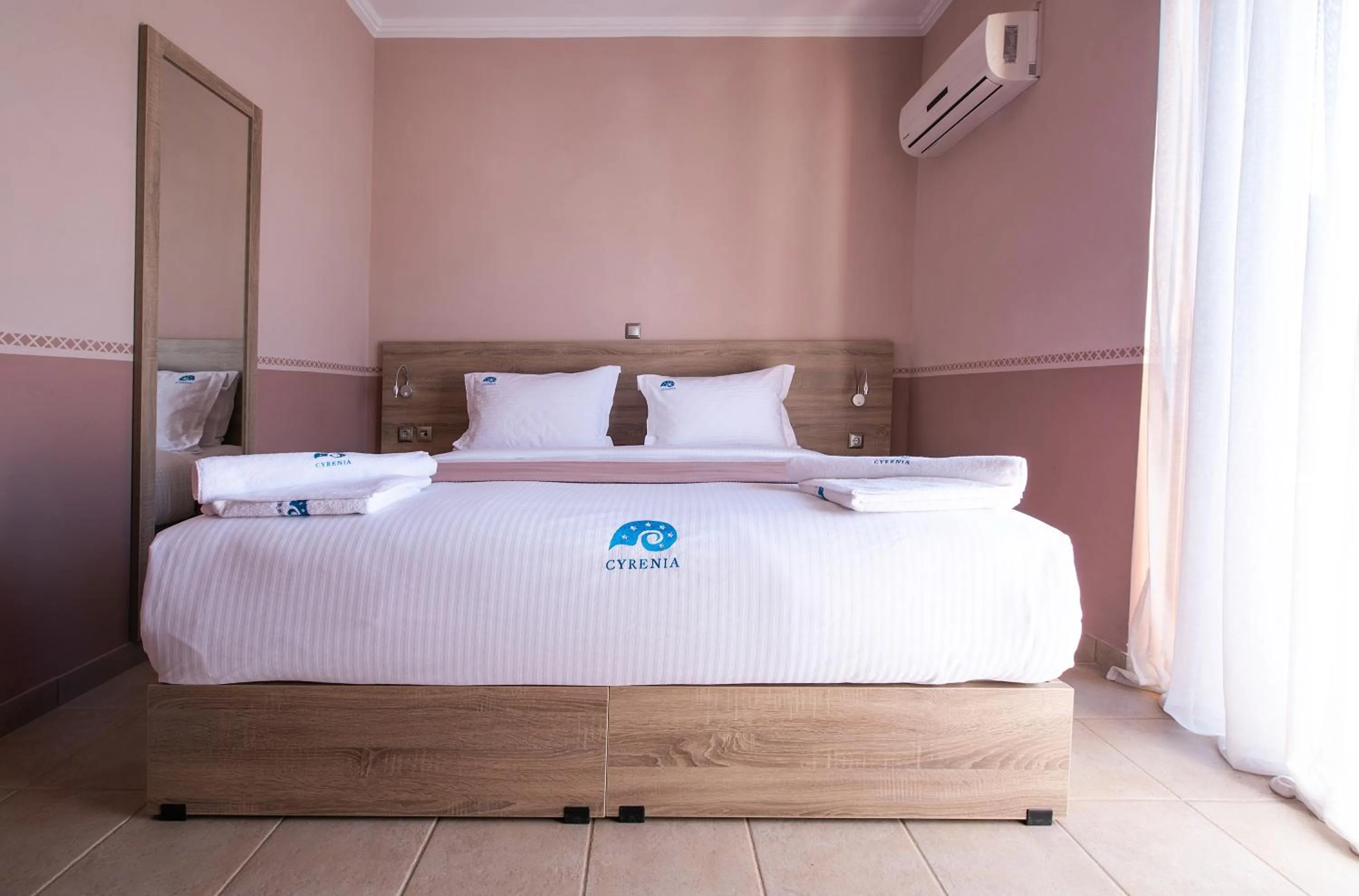 Bed in Cyrenia Guesthouse