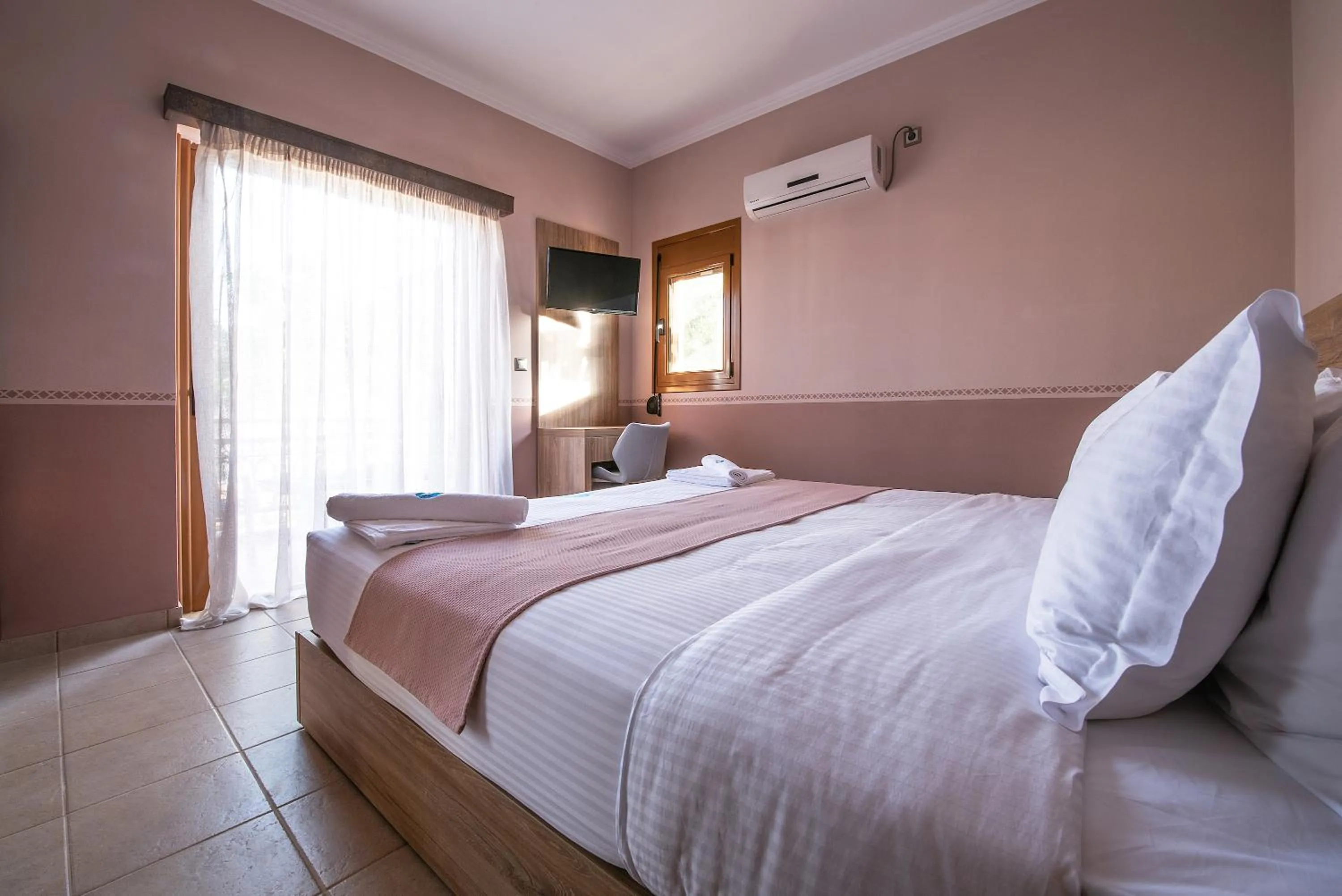 Bed in Cyrenia Guesthouse