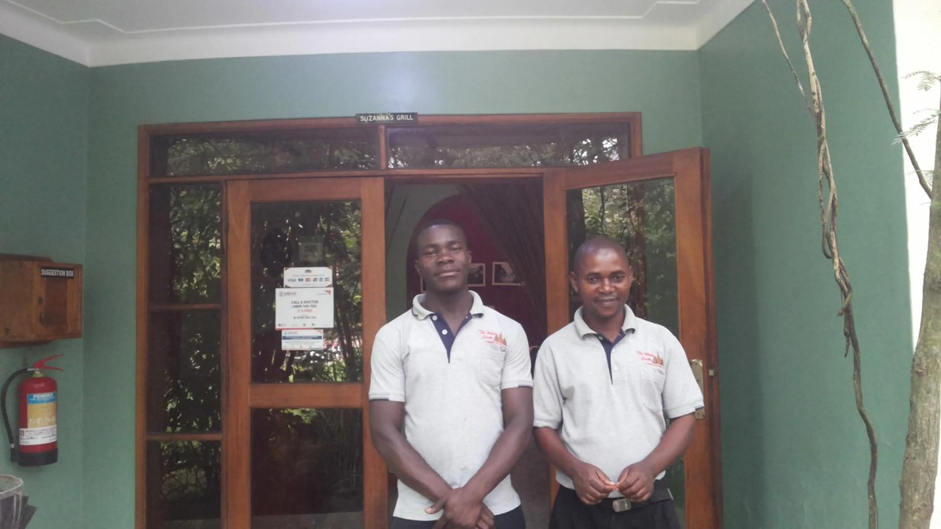 Staff in White Castle Hotel Arua