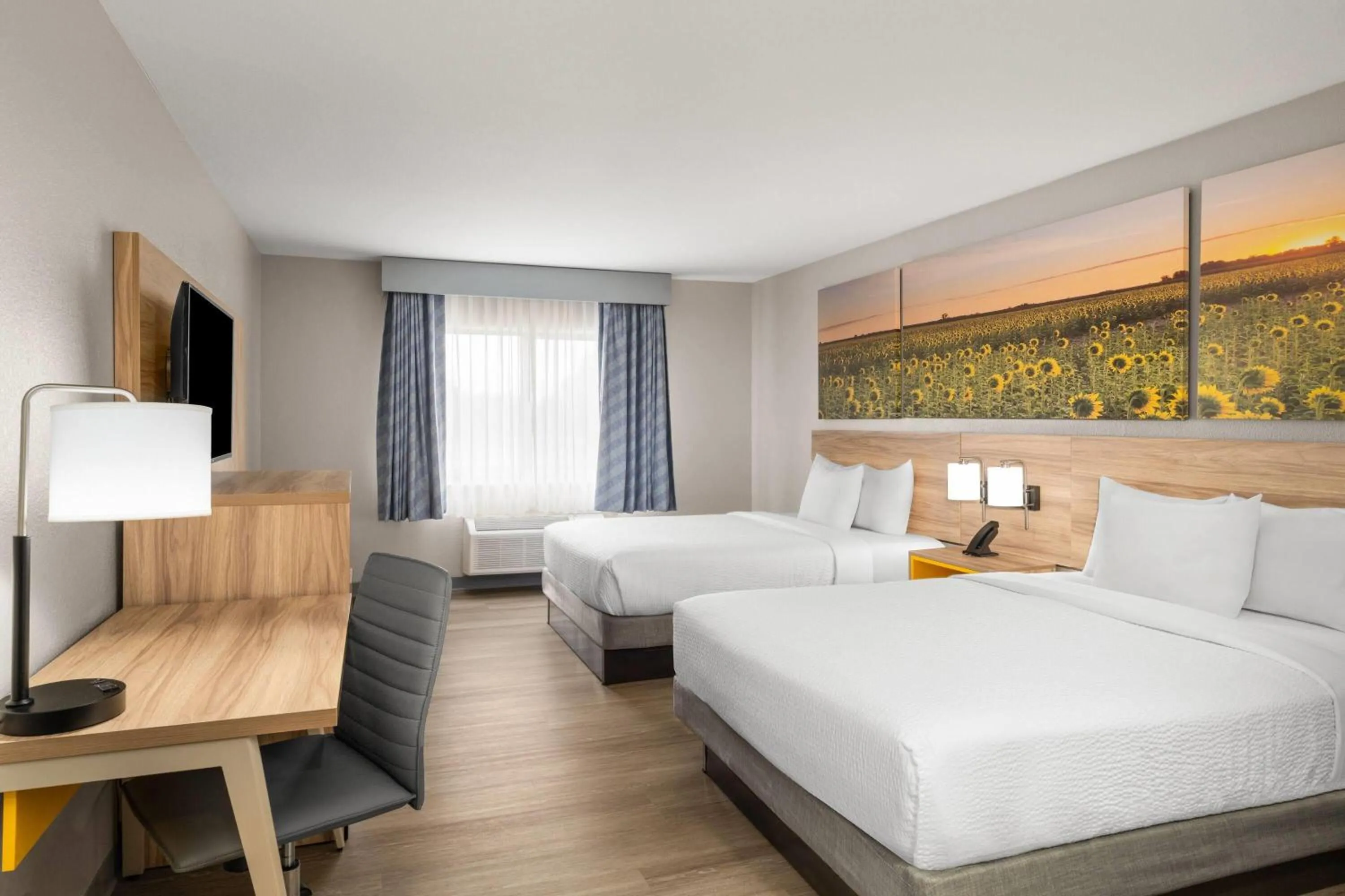 Photo of the whole room, Bed in Days Inn by Wyndham Coffeyville, Kansas