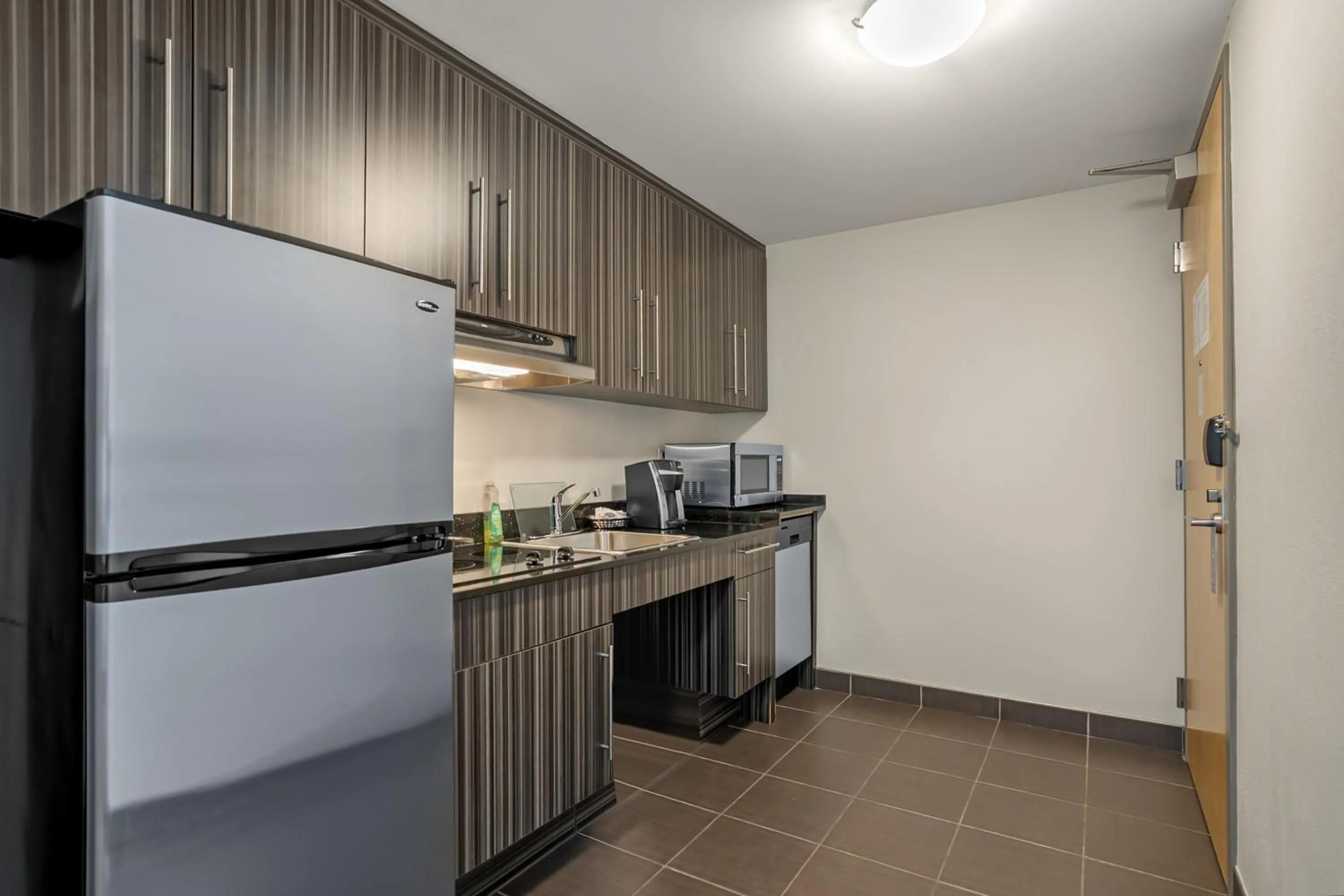 Bedroom in Best Western Plus Airport Inn & Suites