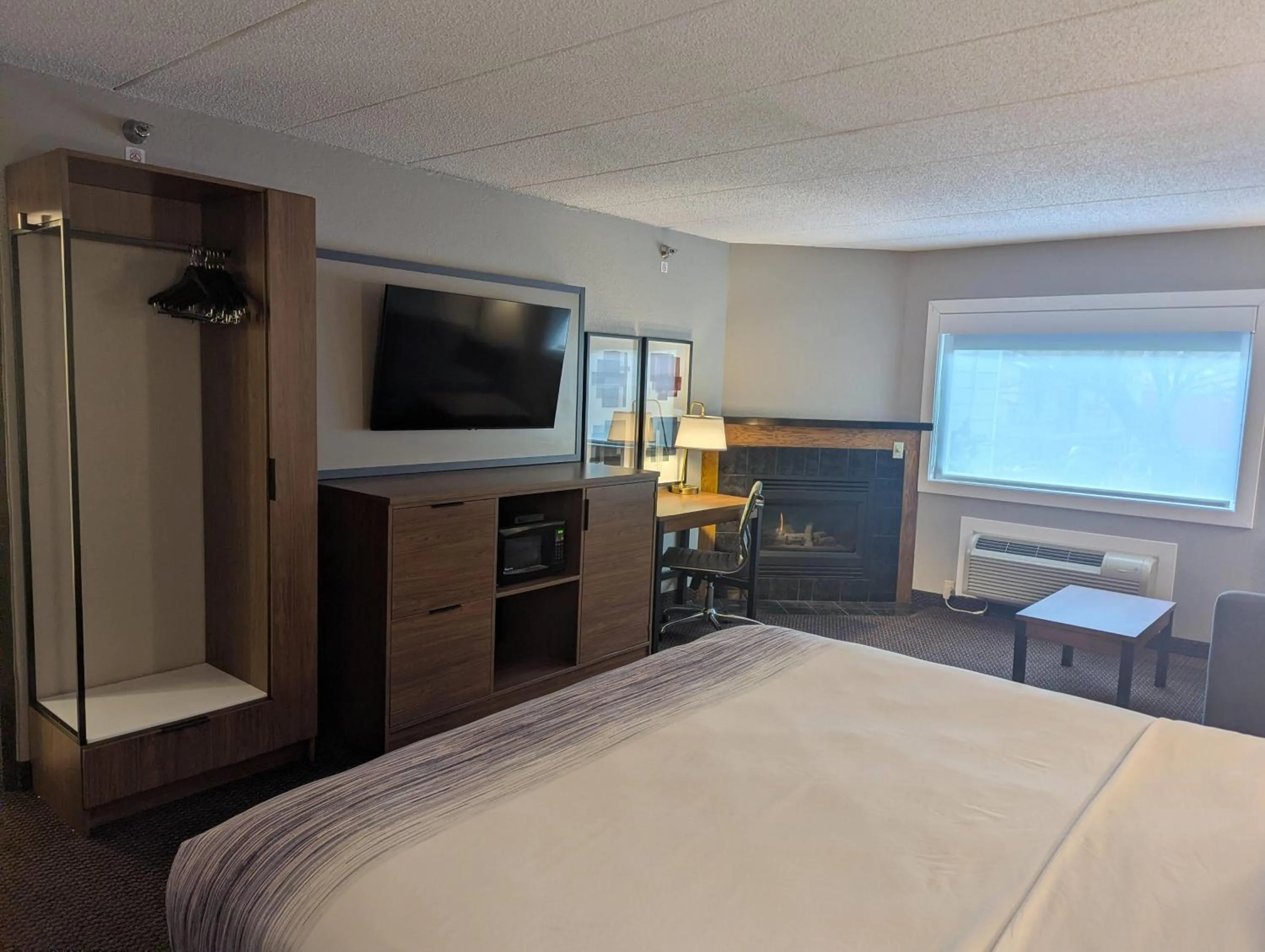 Photo of the whole room, Bed in AmericInn by Wyndham St. Peter