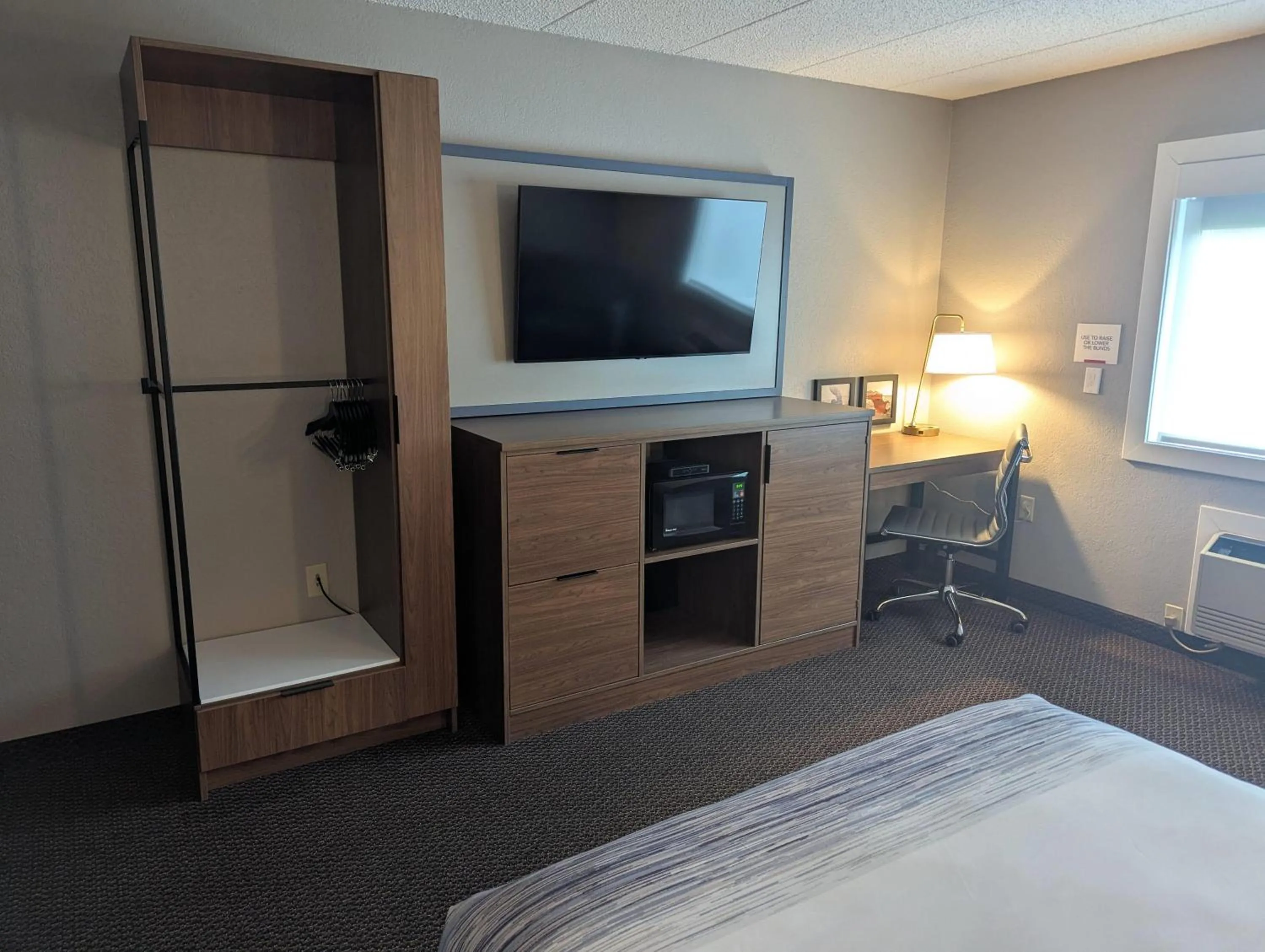 Photo of the whole room, Bed in AmericInn by Wyndham St. Peter