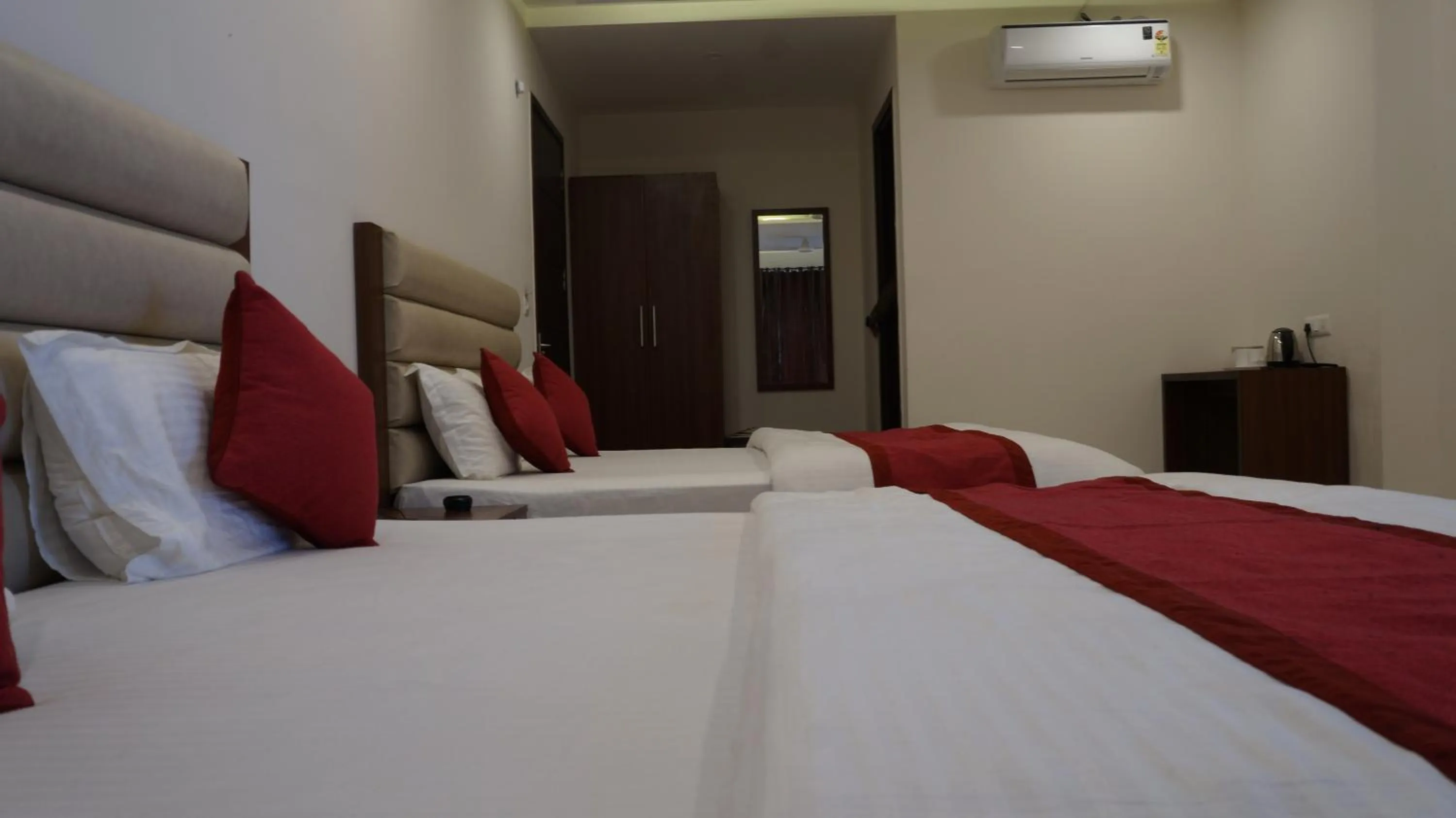 Bedroom in Hotel Aakash Residency