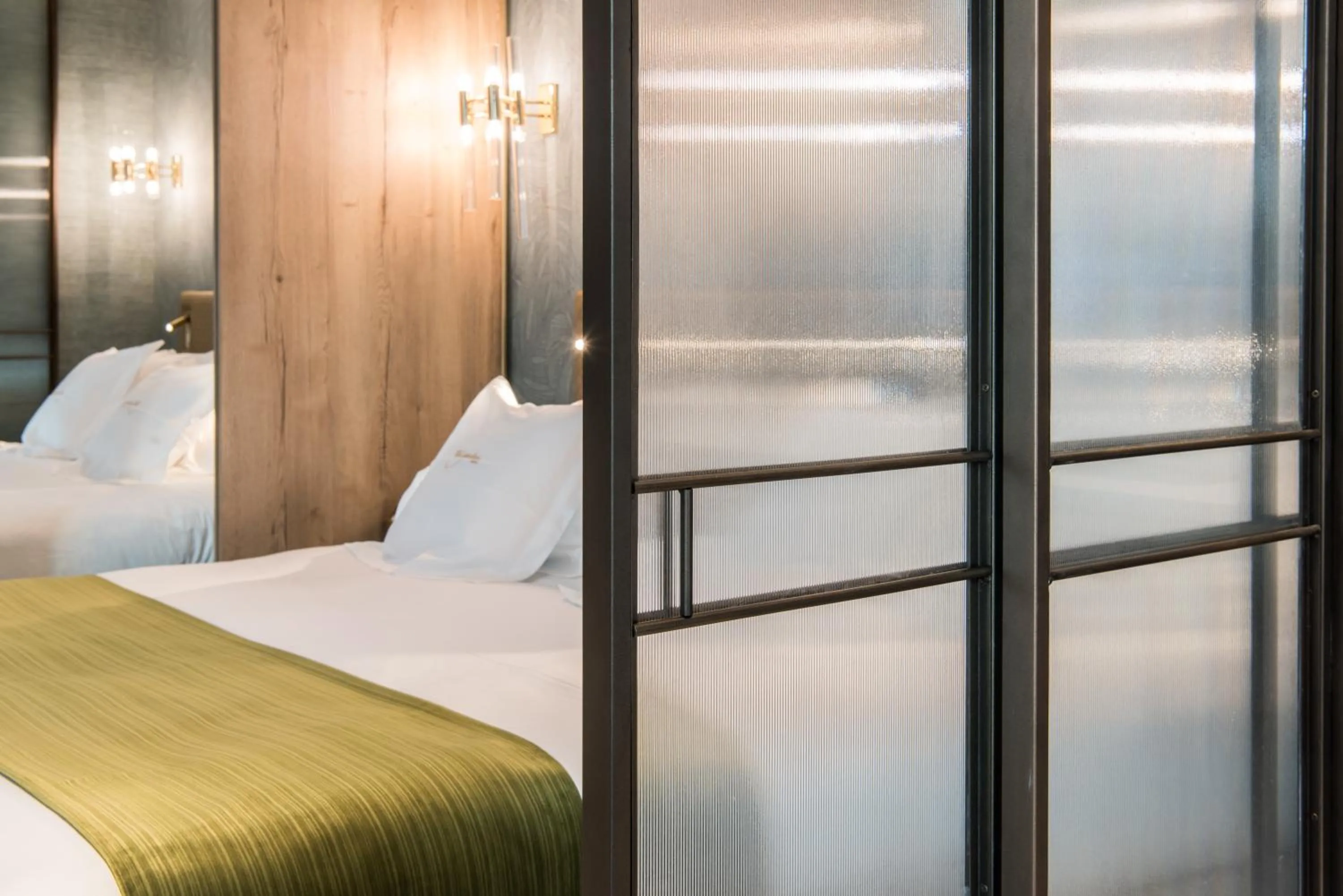 Bed in The Garden Suites