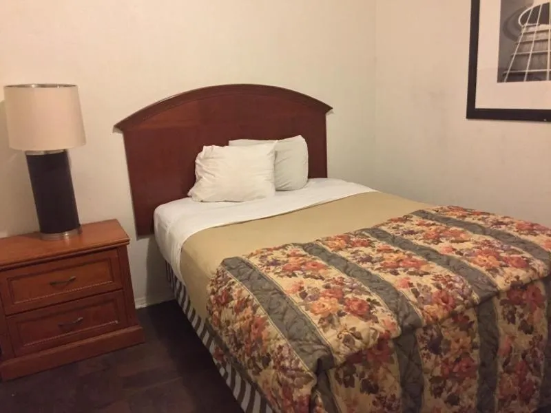 Bed in Ranch House Inn & Suites