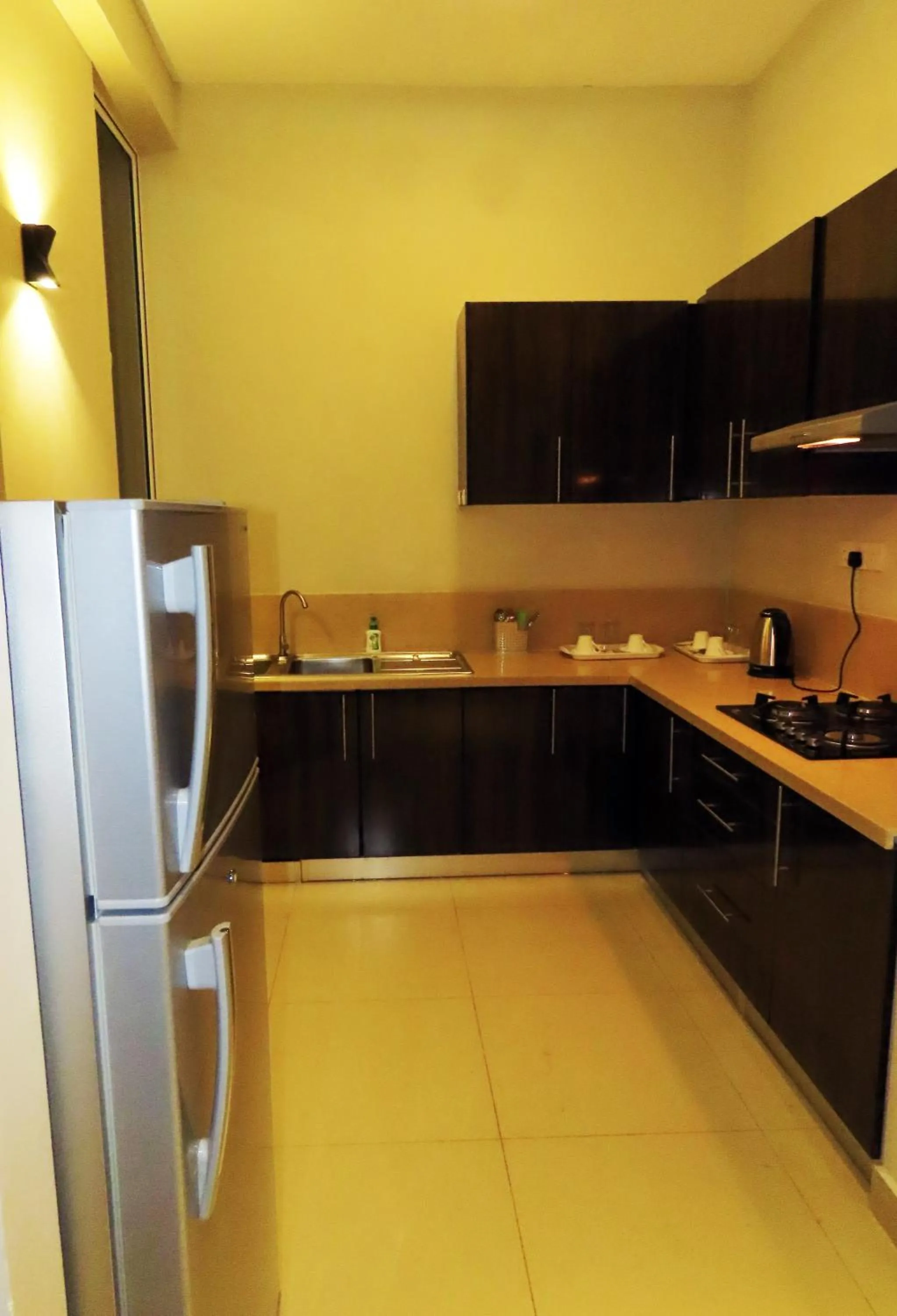 Kitchen or kitchenette in VIVAS Residencies Luxury Apartments