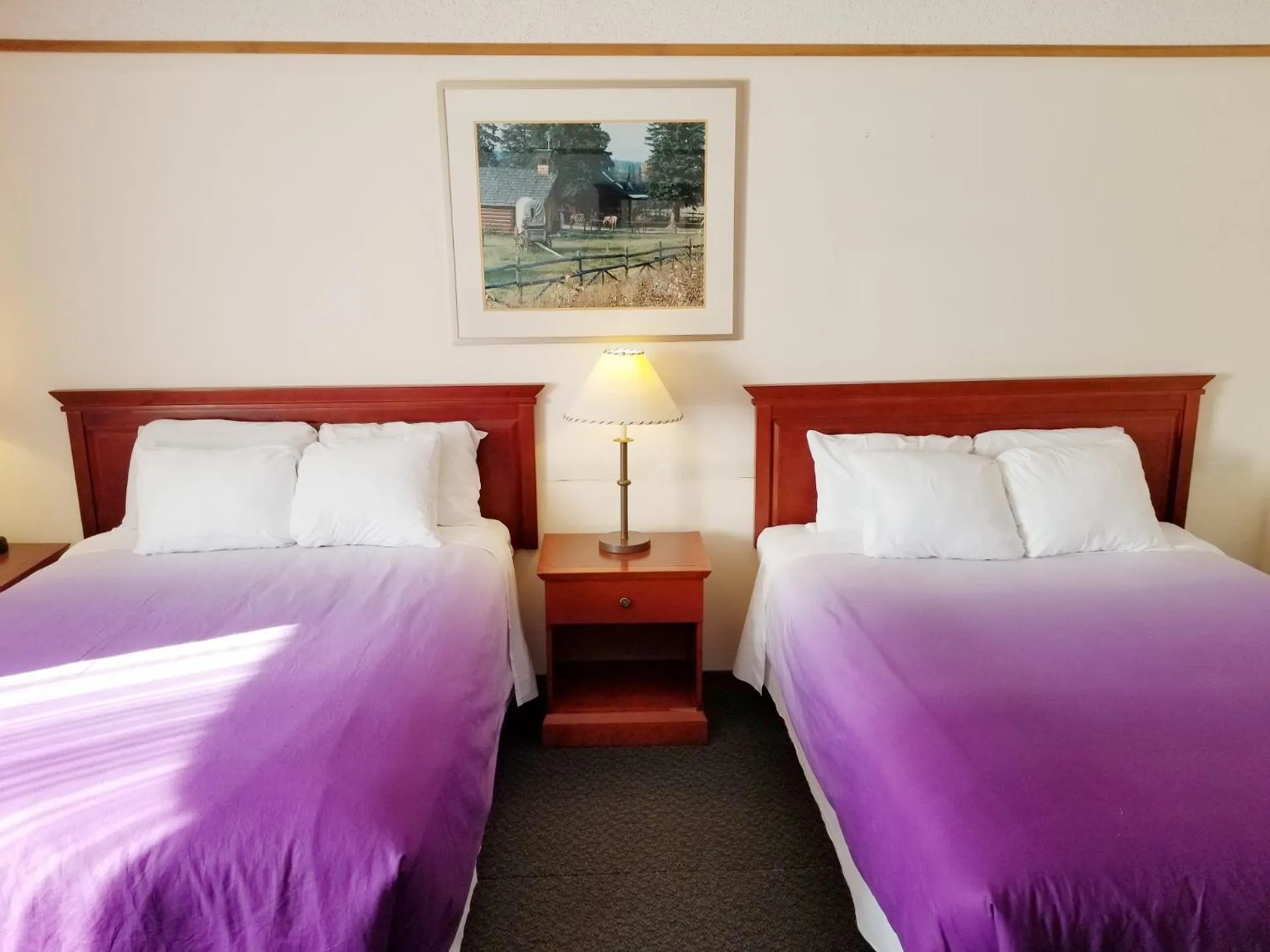 Bed in Moosomin Country Squire Inn