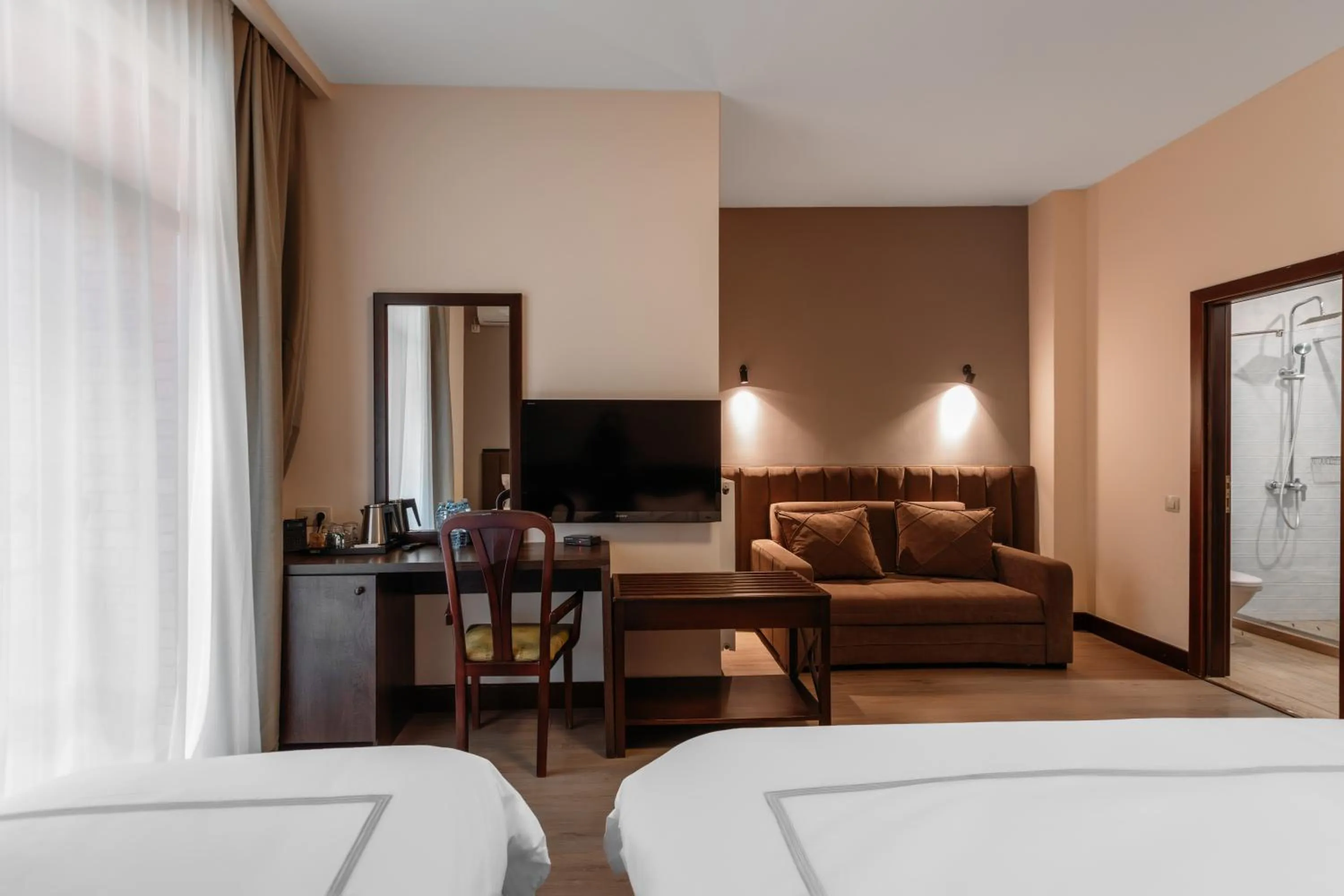 Communal lounge/ TV room, Bed in Elea Old Tbilisi Hotel