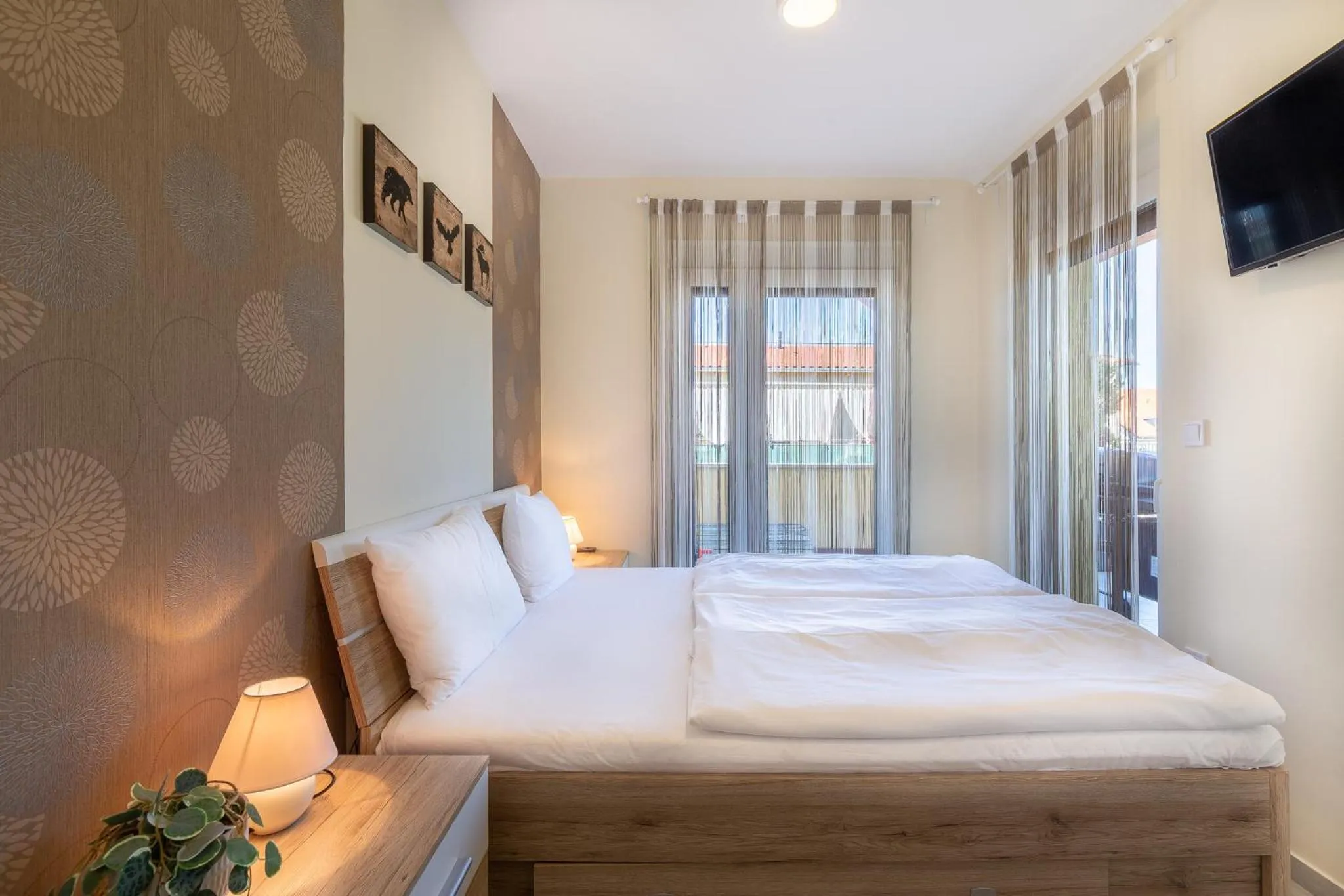 Bed in Casa Luxury Wellness Apartman By BLTN