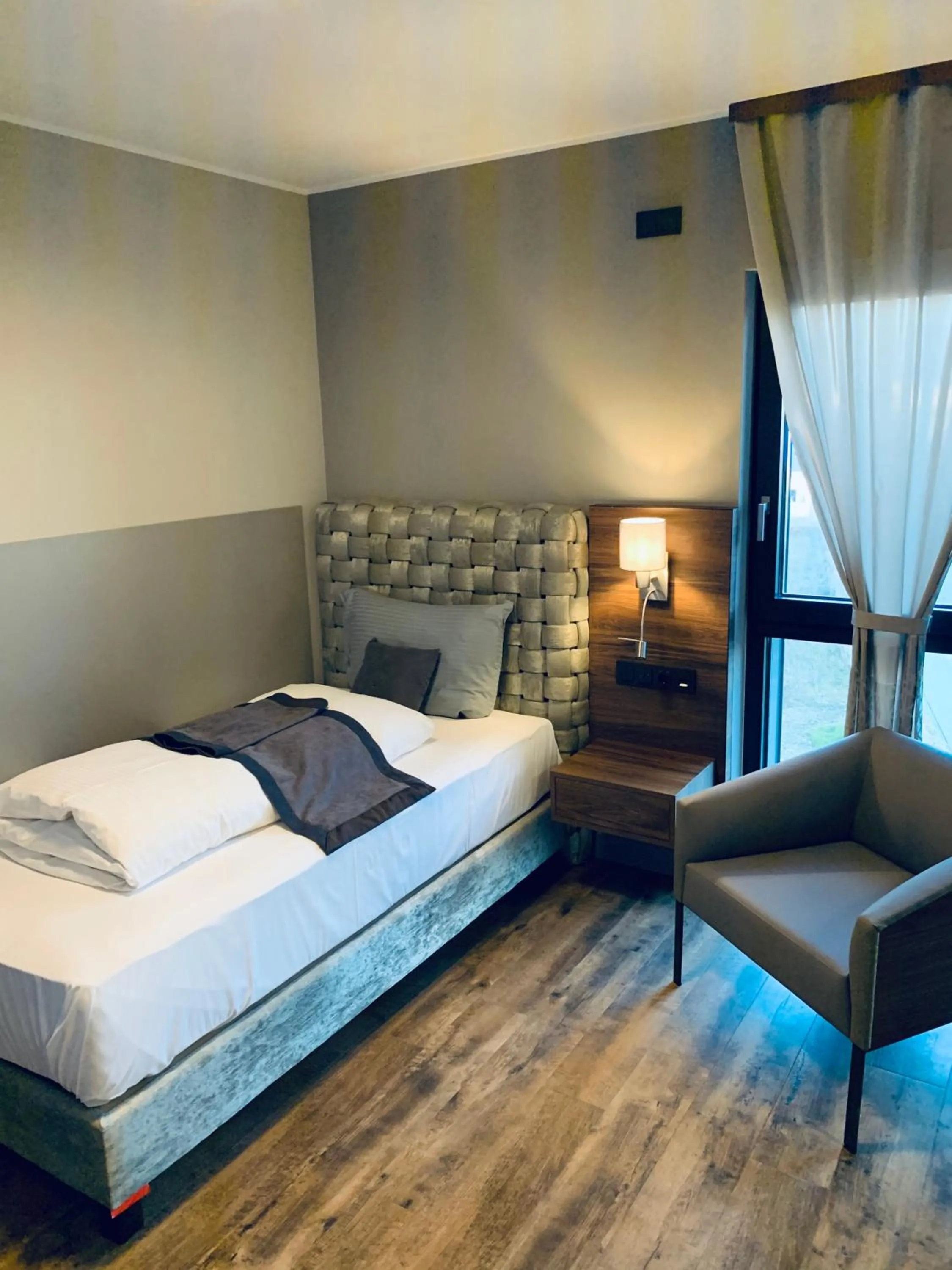 Photo of the whole room, Bed in Intergroup Business & Design Hotel Ingolstadt