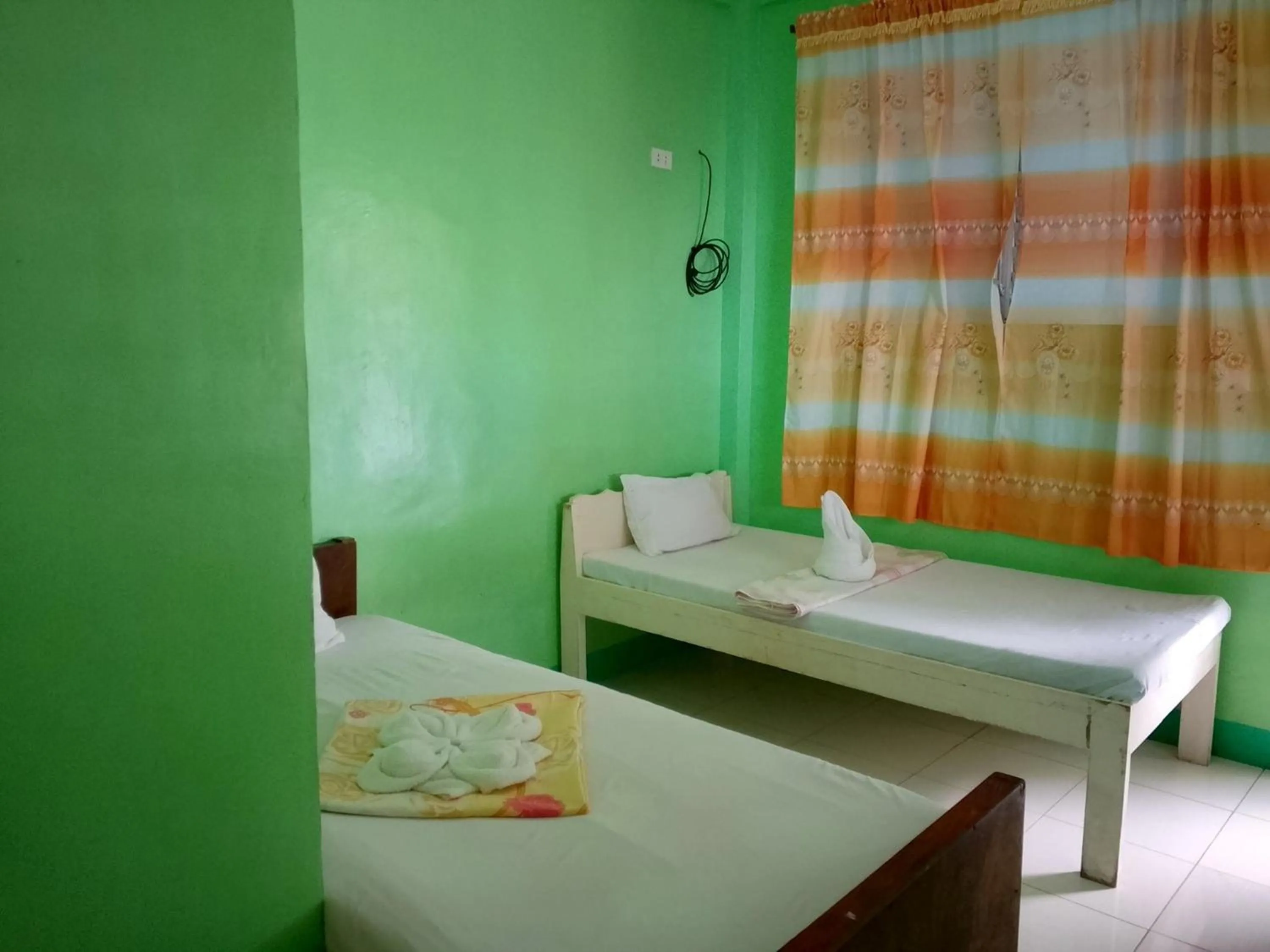 Photo of the whole room, Bed in July's Haven Seaside Pension Camiguin
