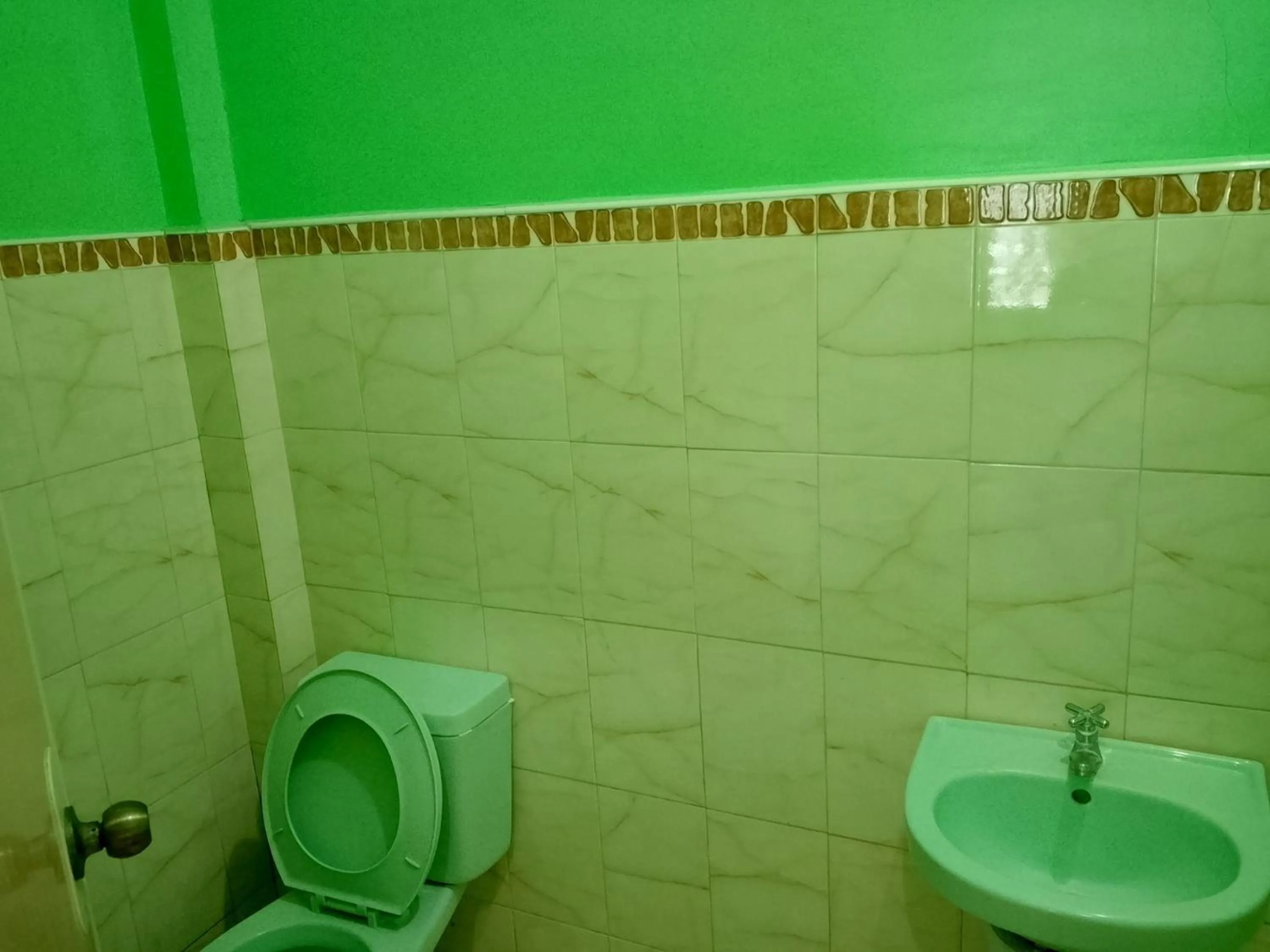 Bathroom in July's Haven Seaside Pension Camiguin