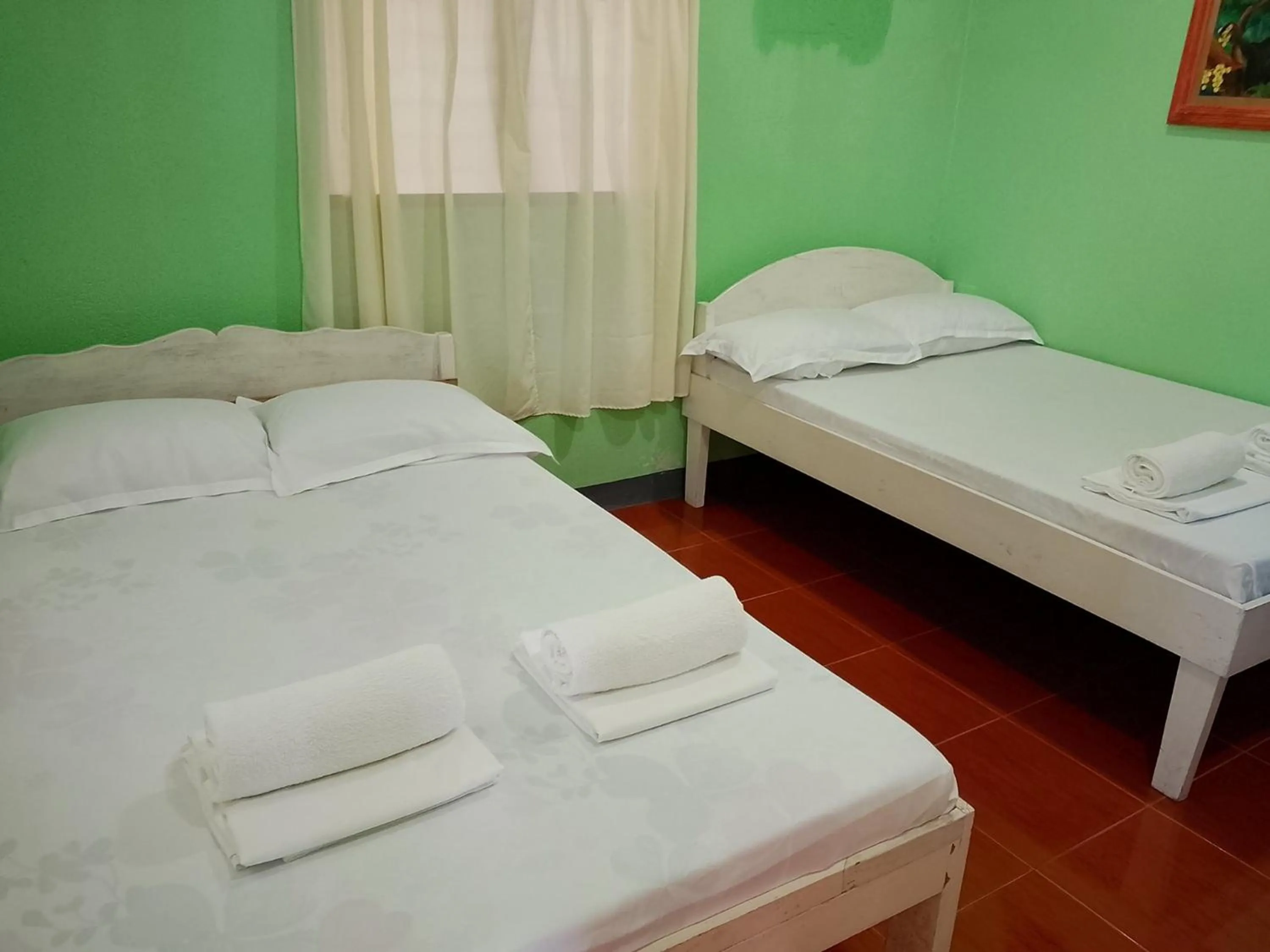 Bedroom, Bed in July's Haven Seaside Pension Camiguin