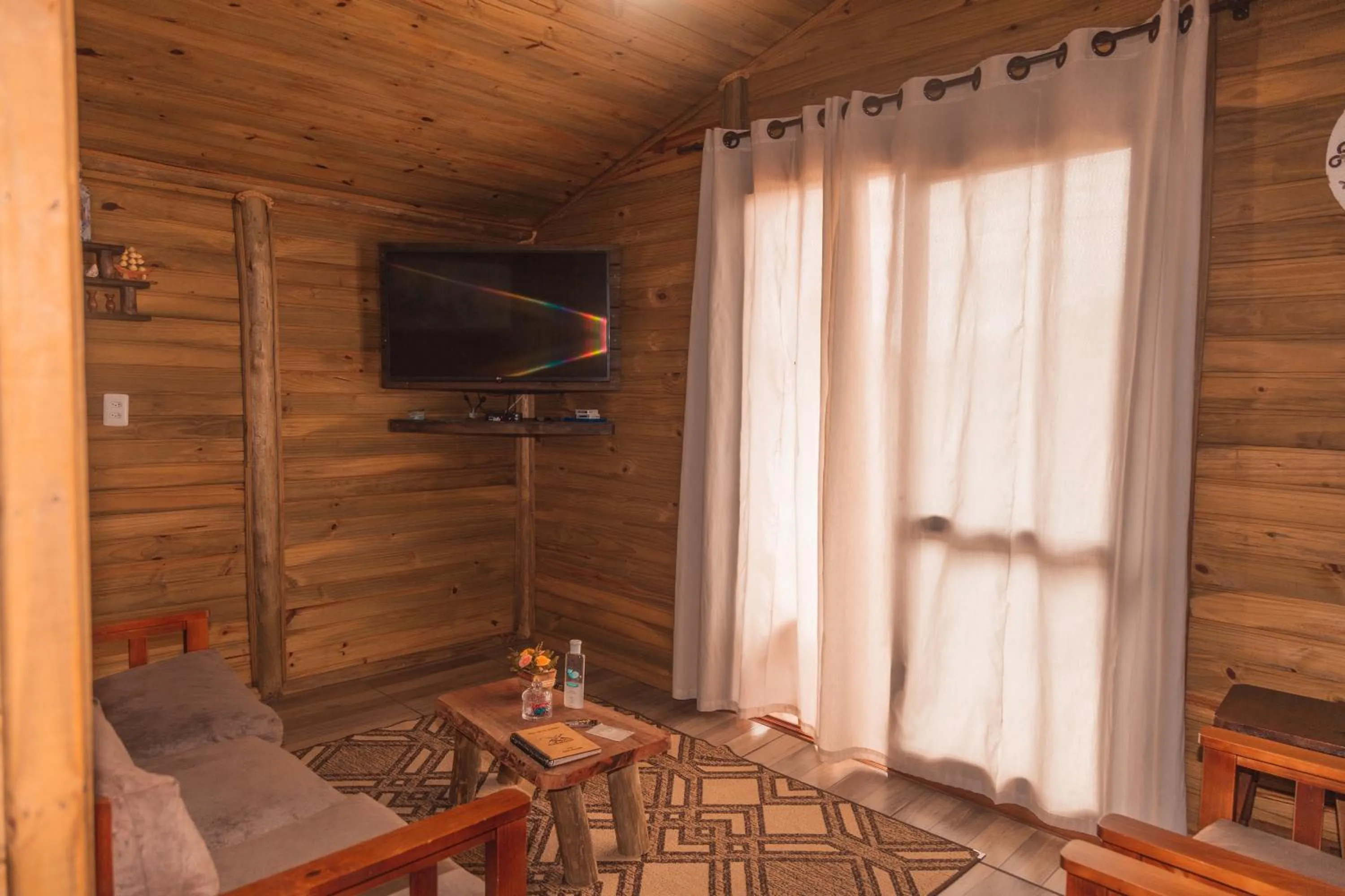 Seating area in Pousada Recanto dos Canyons