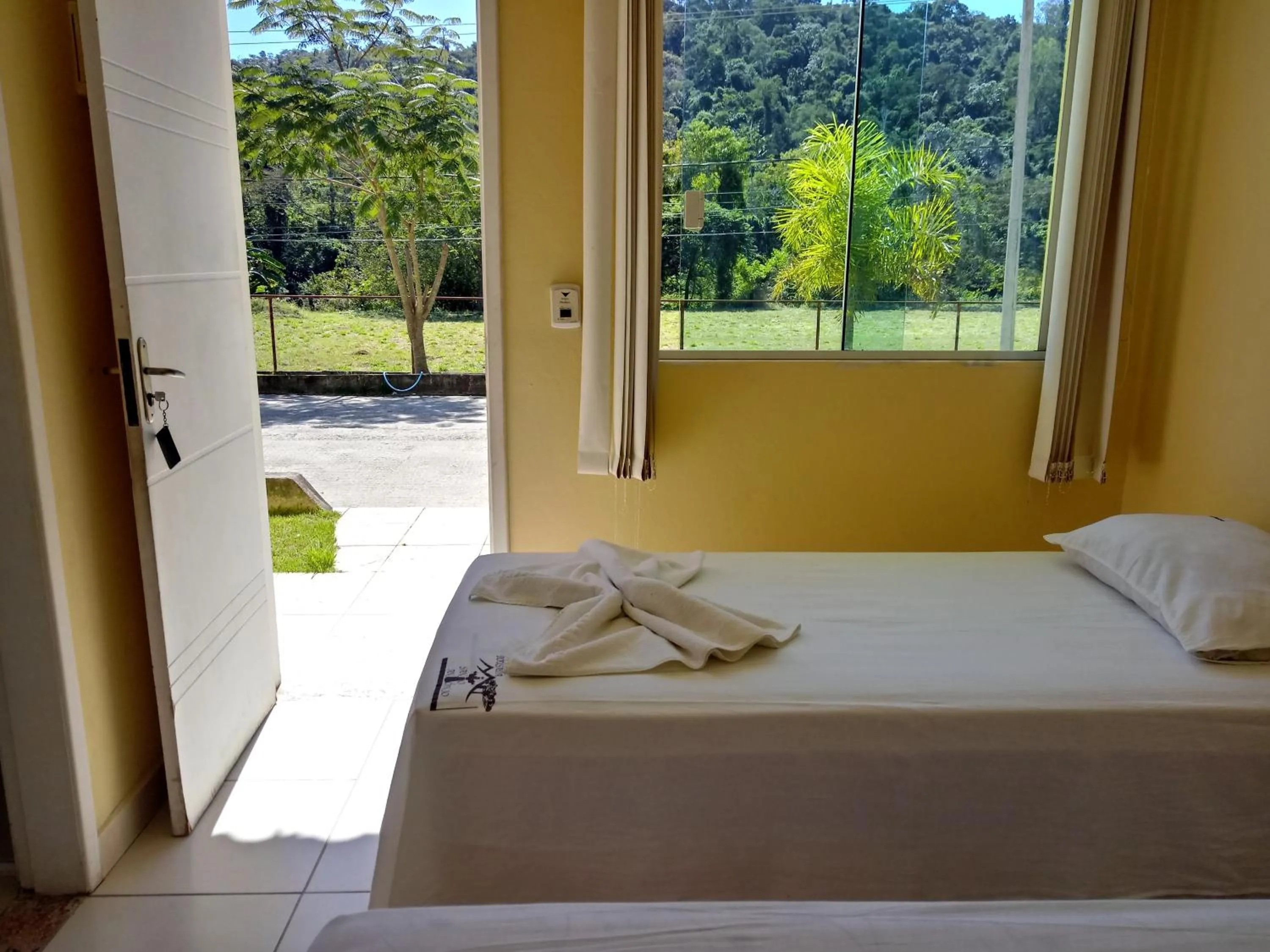Bed in Pousada Santo Antônio