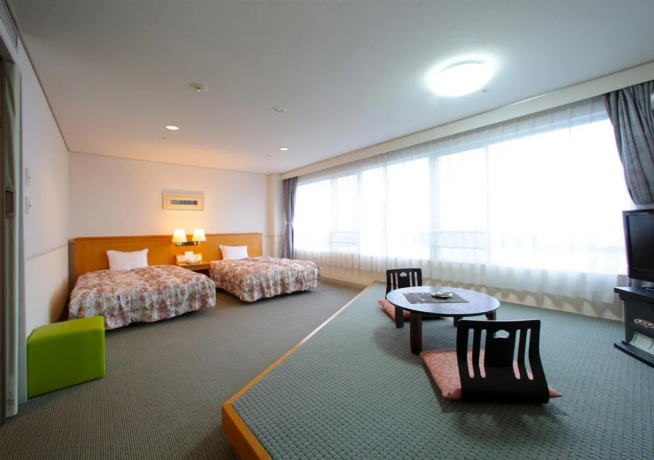 Photo of the whole room, Bed in Shikinoyado SAHIMENO