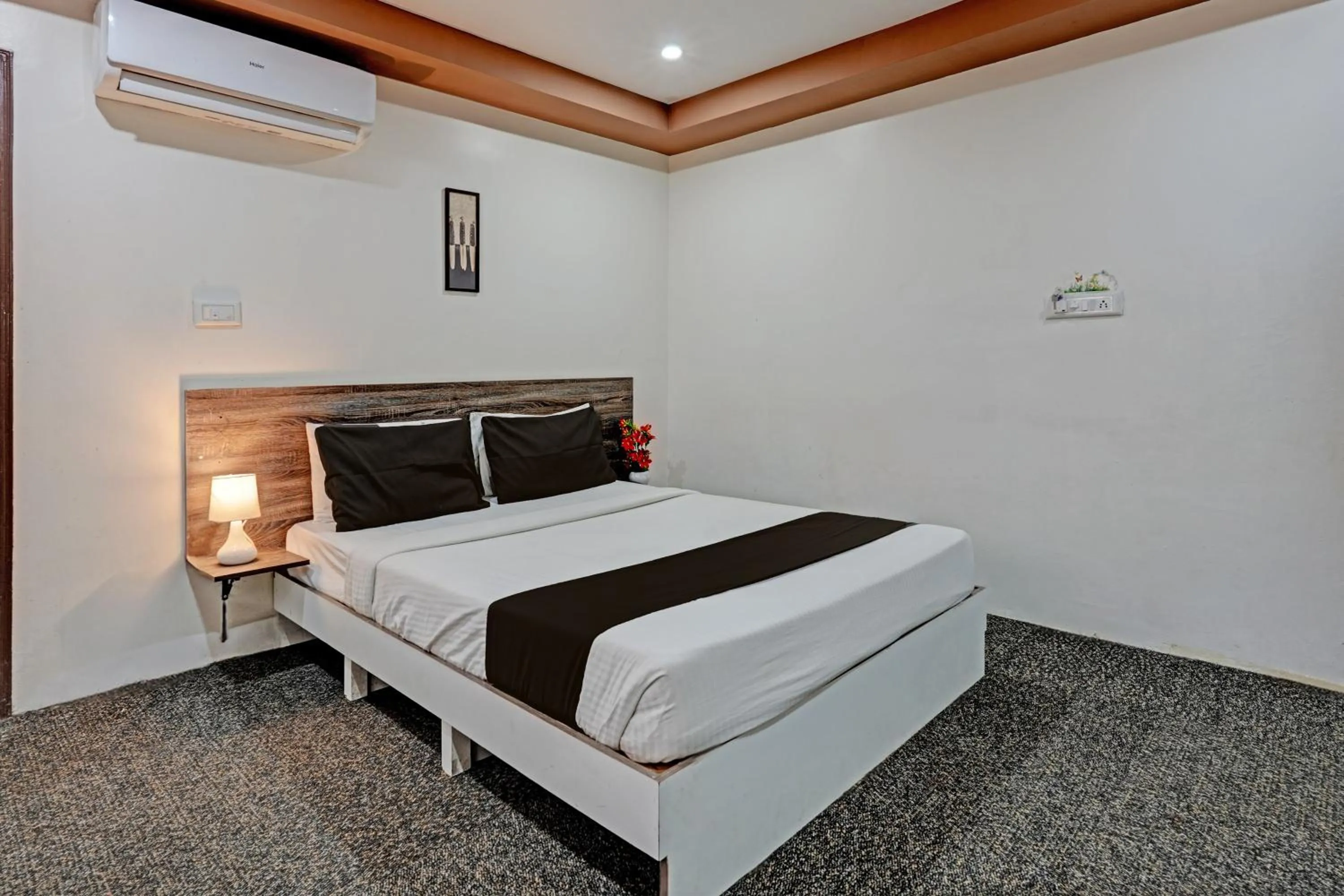 Bedroom in Hotel O Sri Sai sevalal comfort's