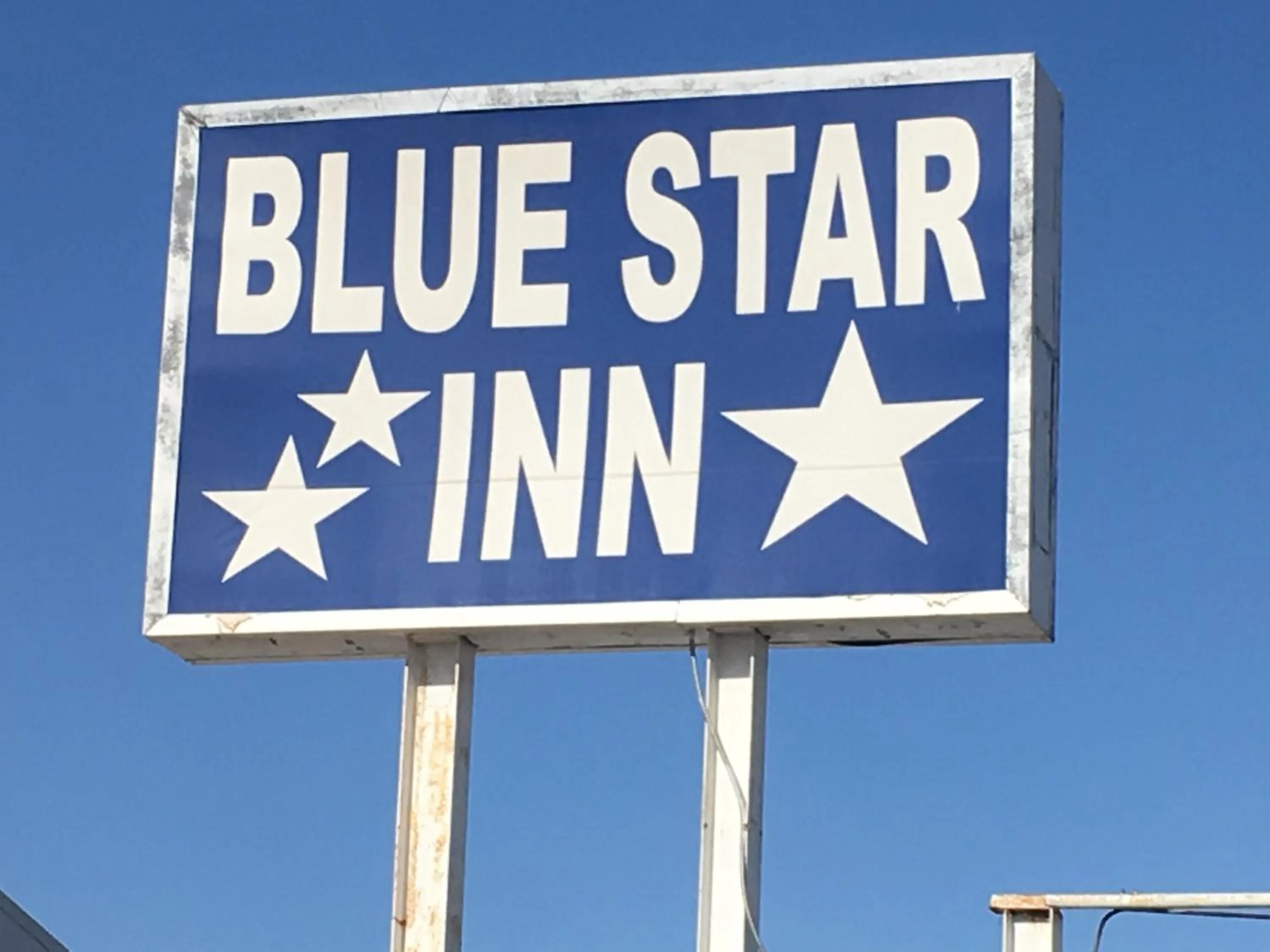 Property logo or sign in Blue Star Inn