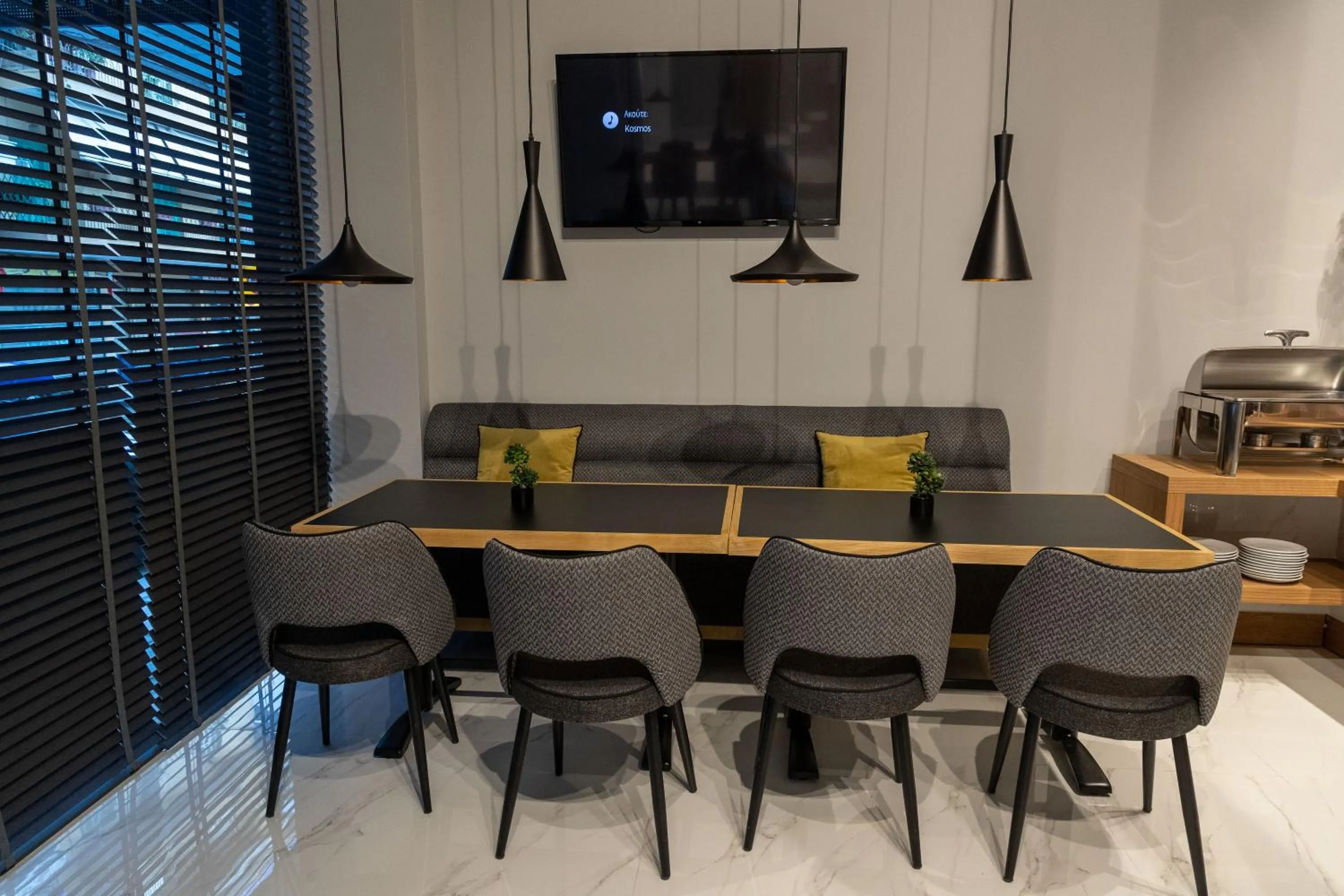 Seating area in Grand Port Suites