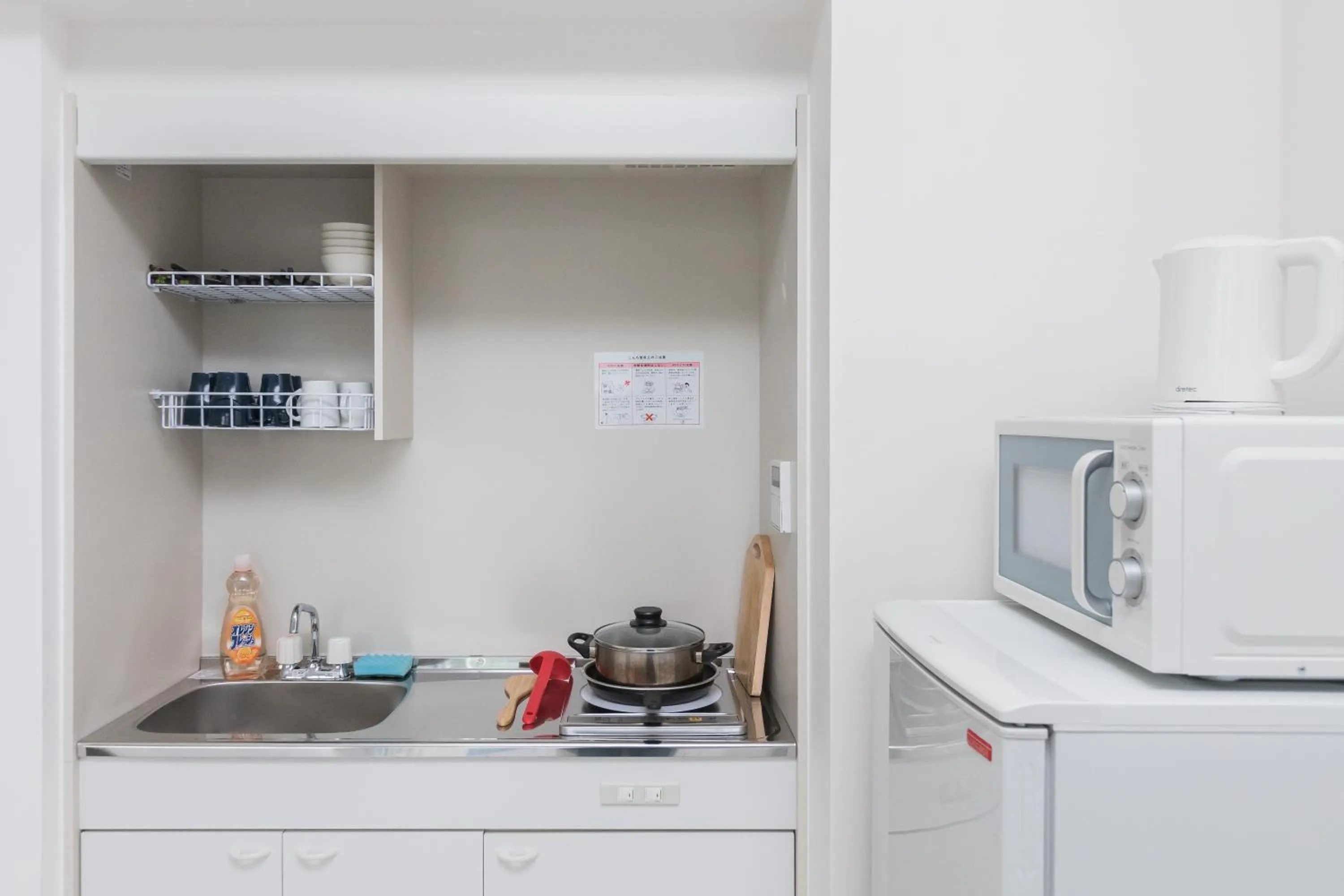 Kitchen or kitchenette in Hotel Apartment Ueno Inaricho Sta