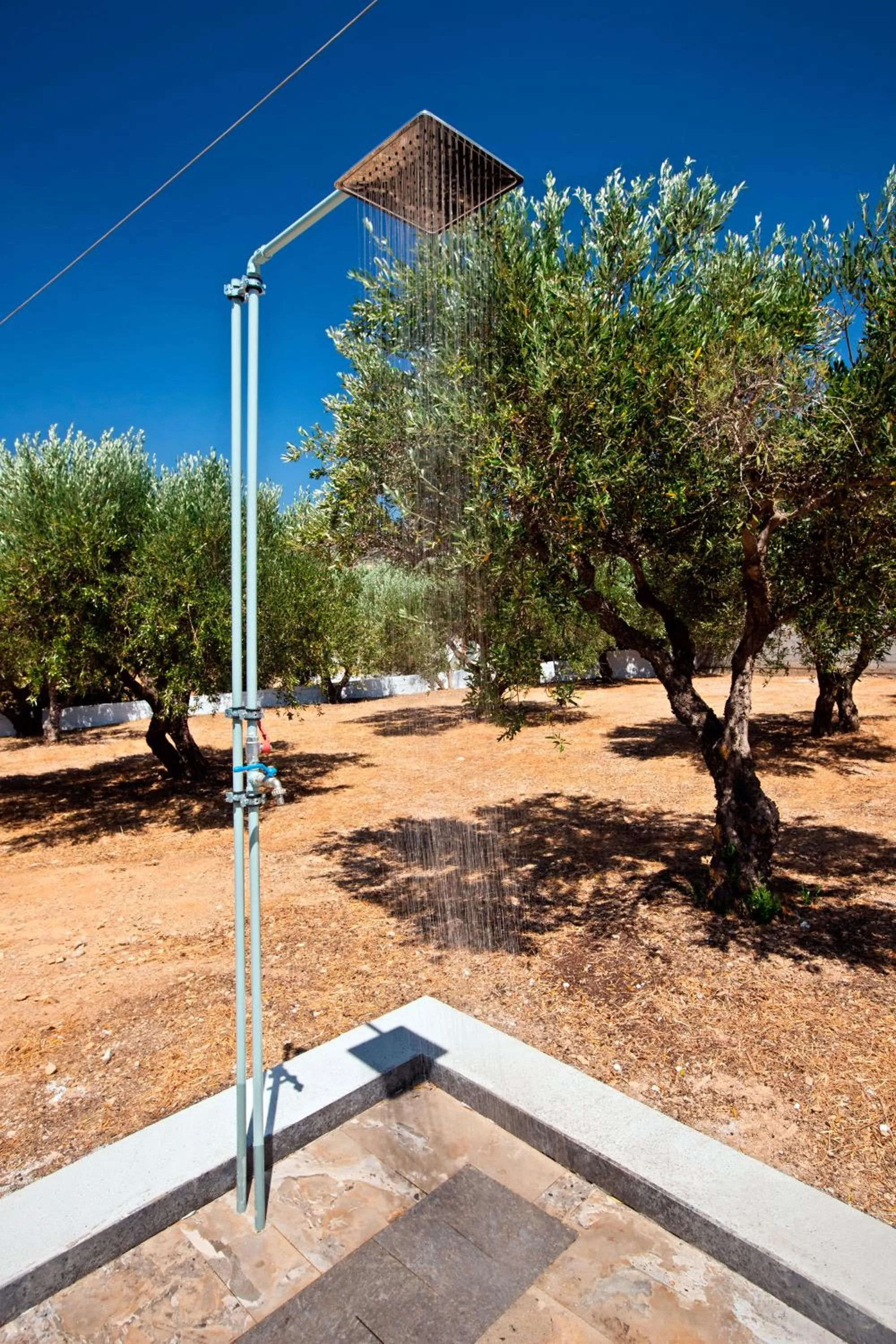 Shower in New Aurora Apts Studios