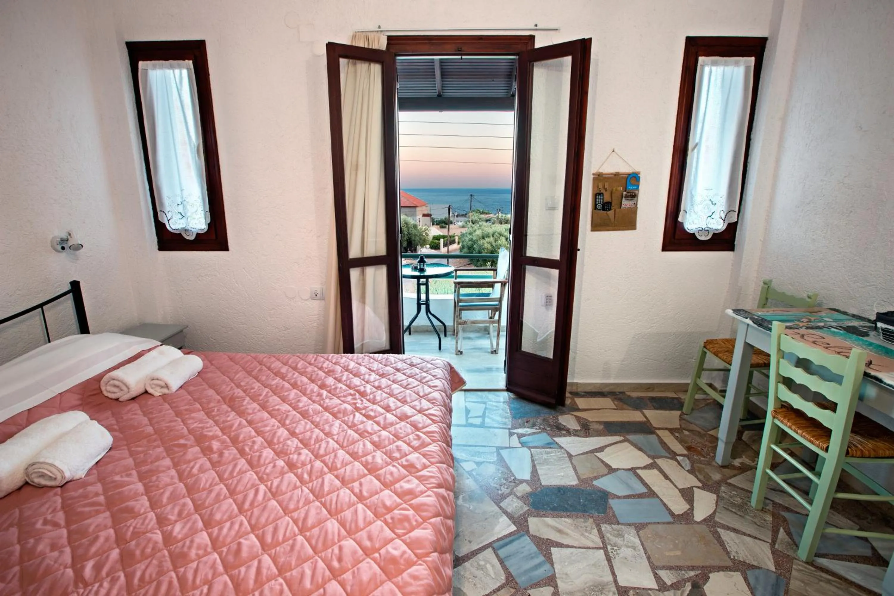 Bed in New Aurora Apts Studios