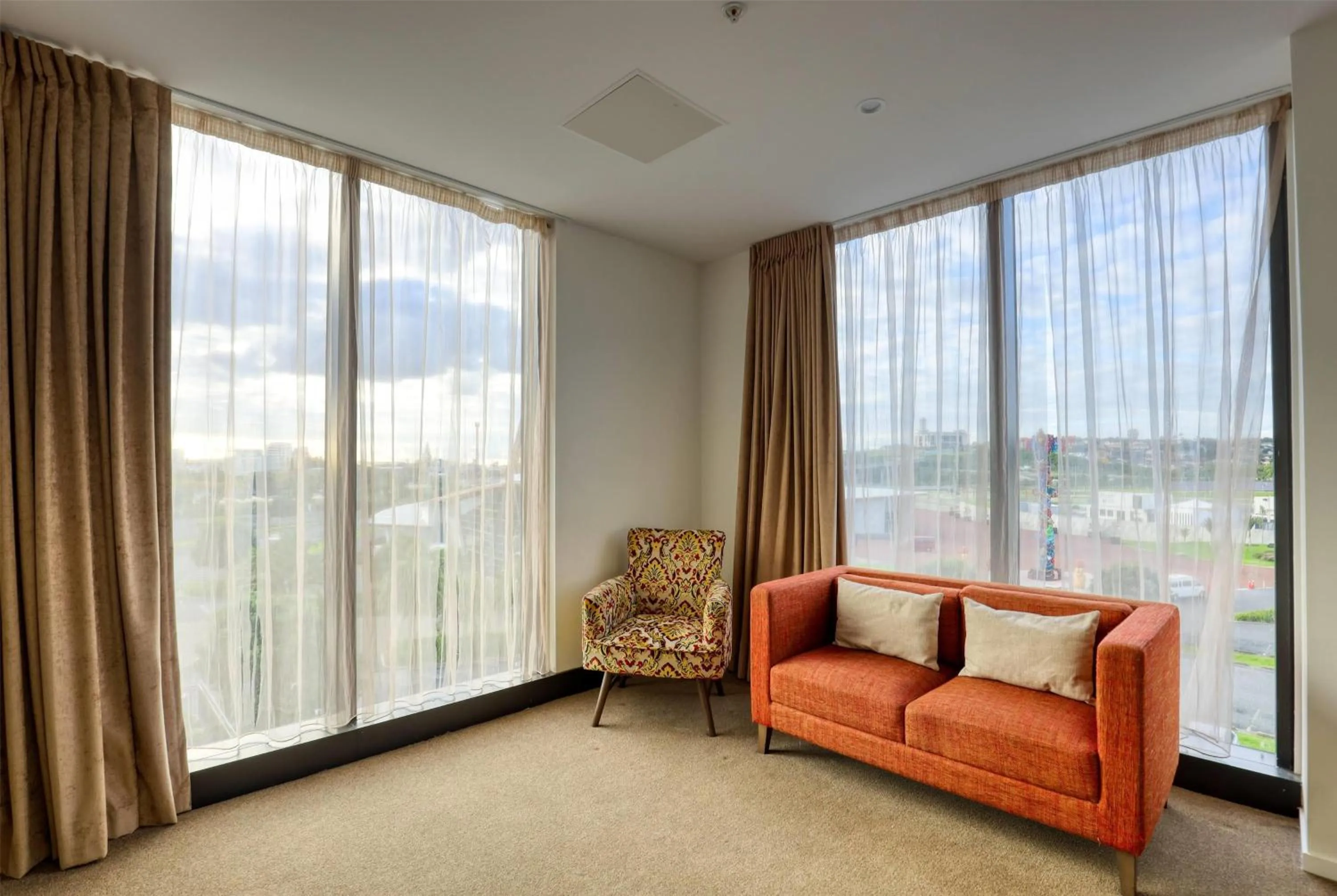 Photo of the whole room in Ramada Suites by Wyndham Auckland Manukau Pacfic Centre