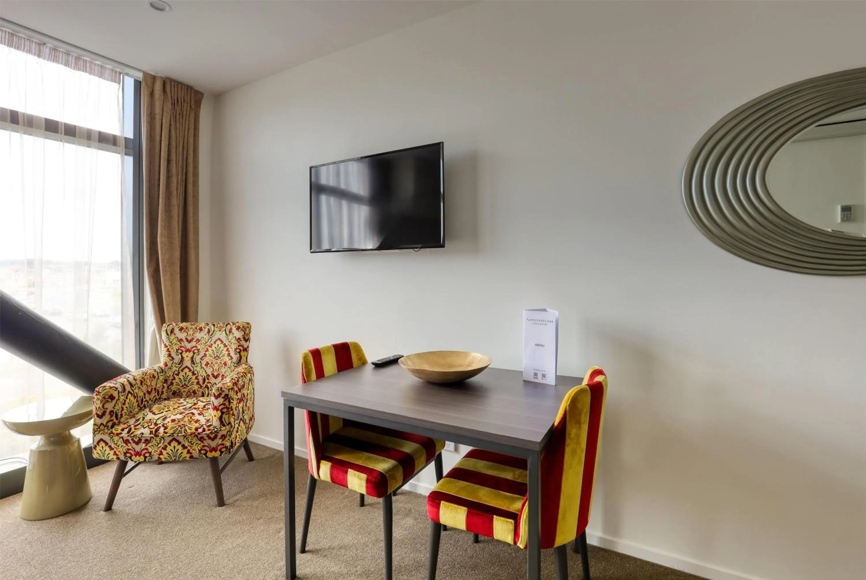 Photo of the whole room in Ramada Suites by Wyndham Auckland Manukau Pacfic Centre