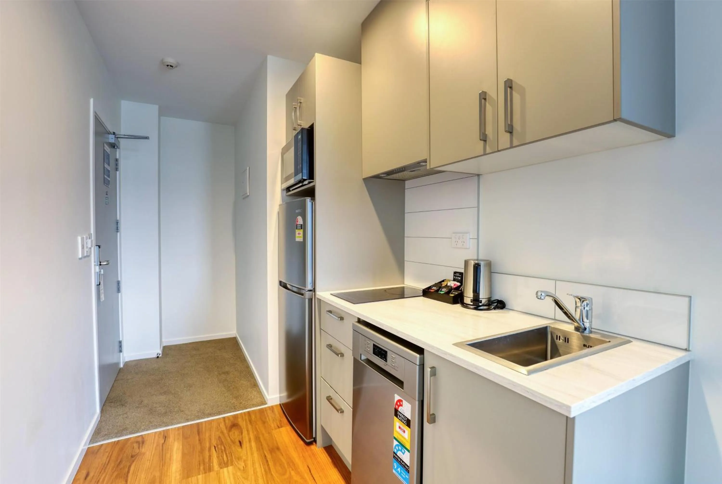 Photo of the whole room in Ramada Suites by Wyndham Auckland Manukau Pacfic Centre