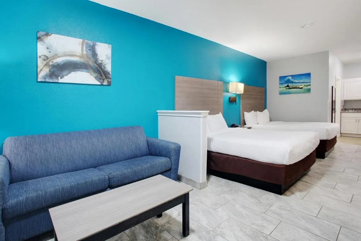 Photo of the whole room, Bed in Plantation Suites and Conference Center