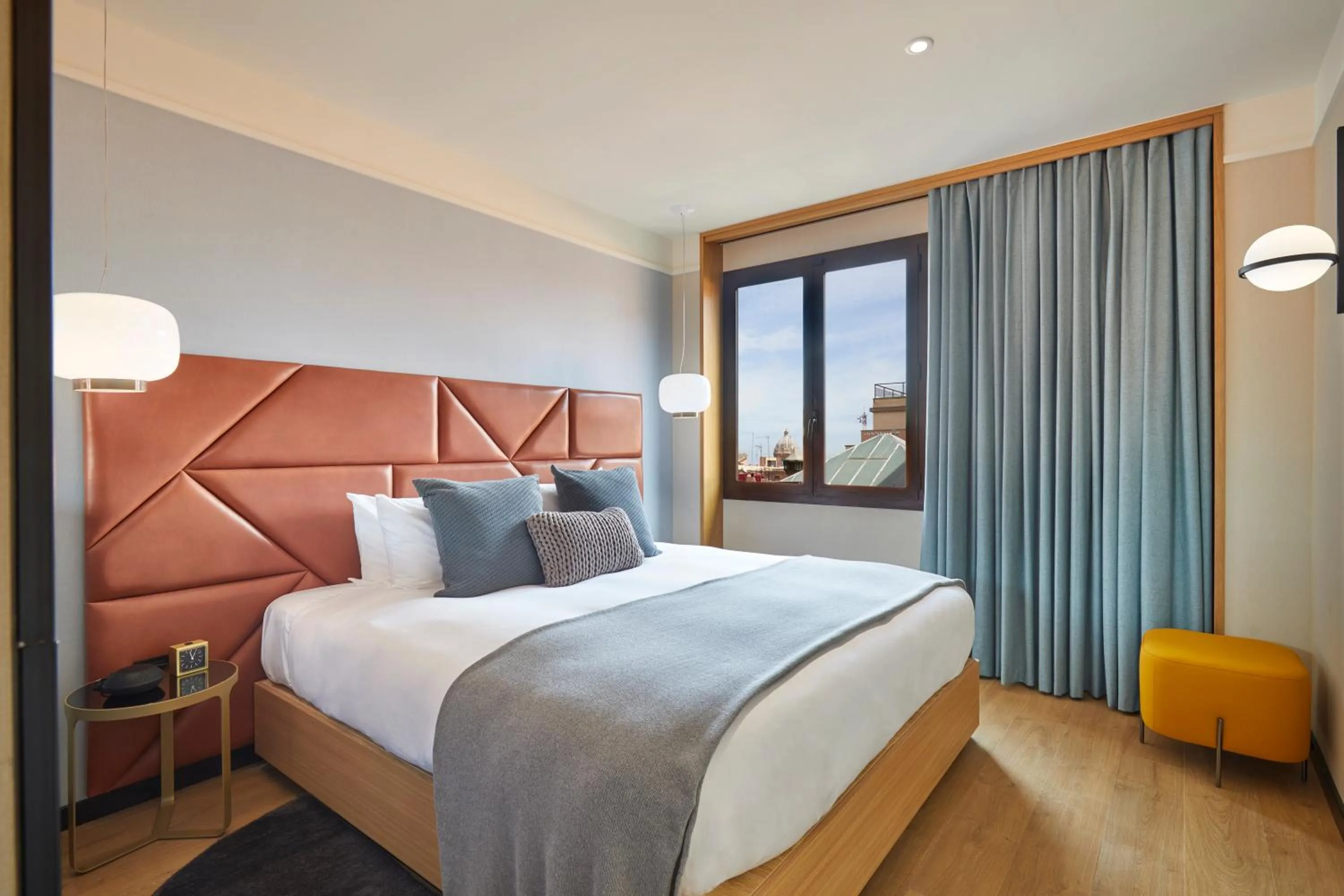 Bed in Kimpton Vividora Hotel by IHG