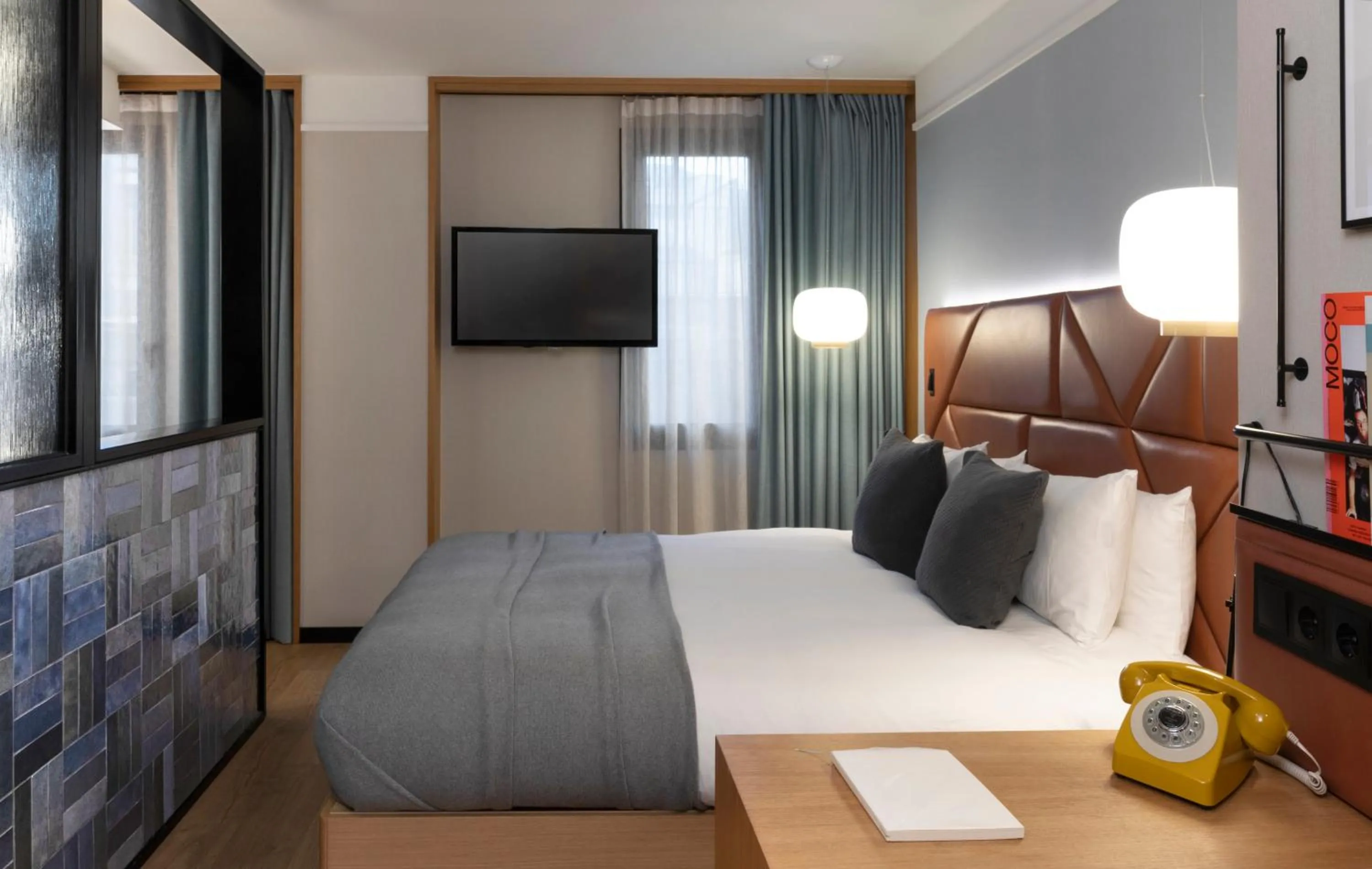 Bed in Kimpton Vividora Hotel by IHG