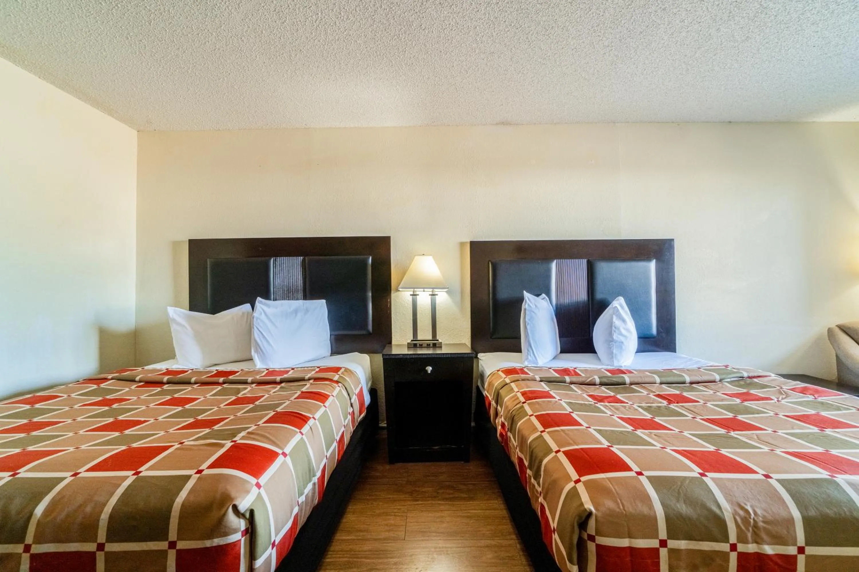 Bed in Executive Inn Port Lavaca by OYO