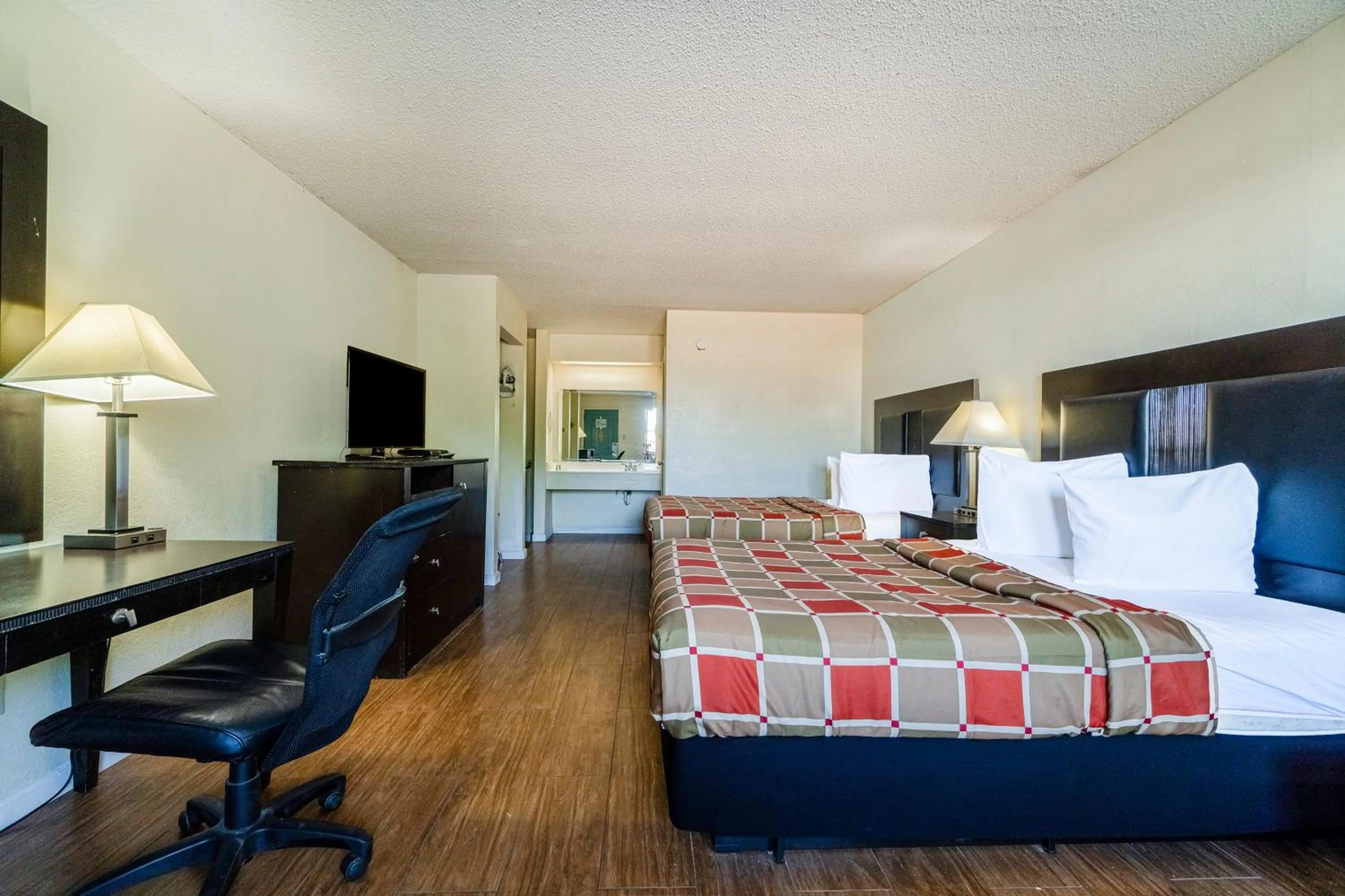 Bedroom, Bed in Executive Inn Port Lavaca by OYO