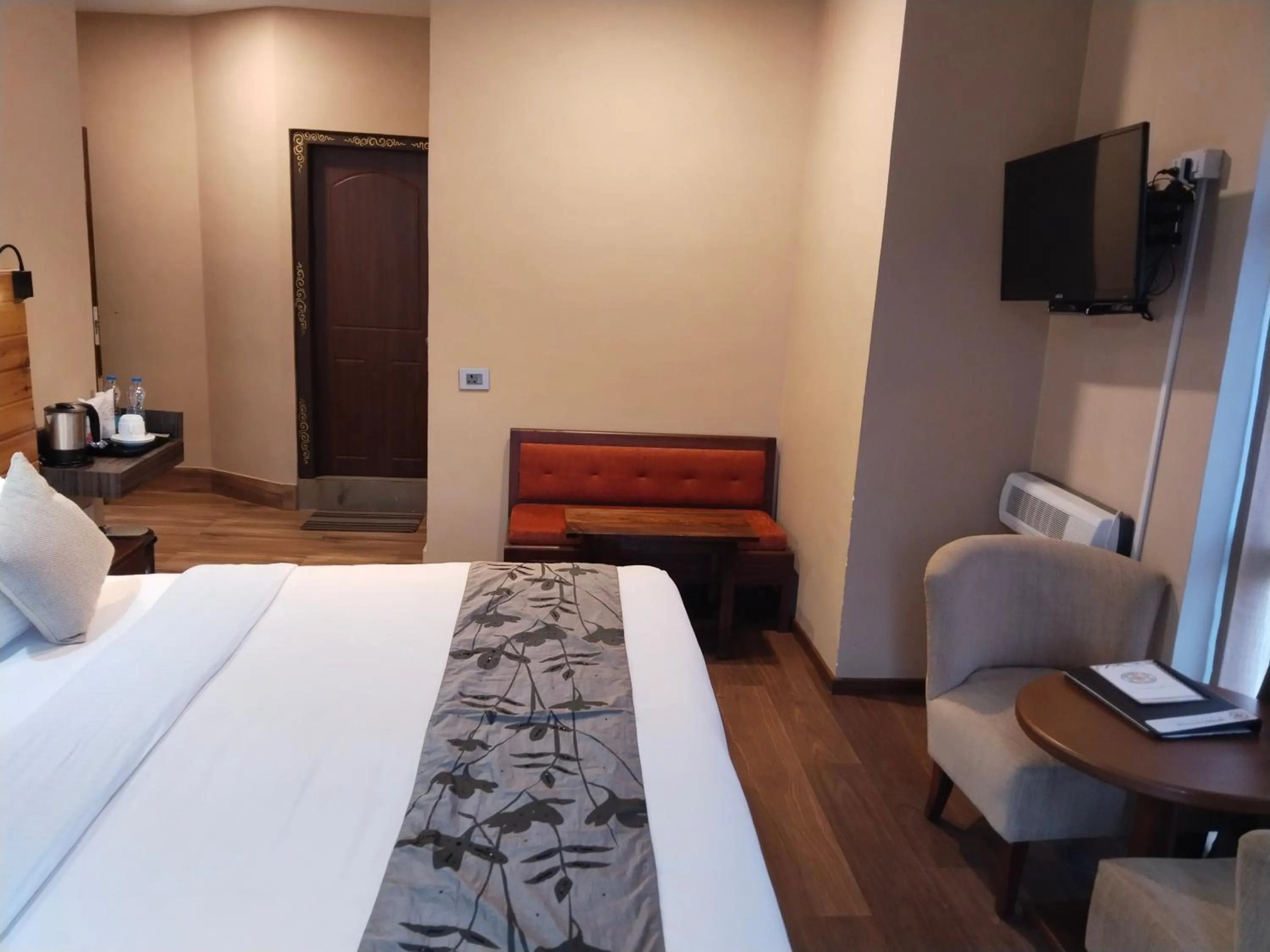 Seating area, Bed in Nirvana Inn