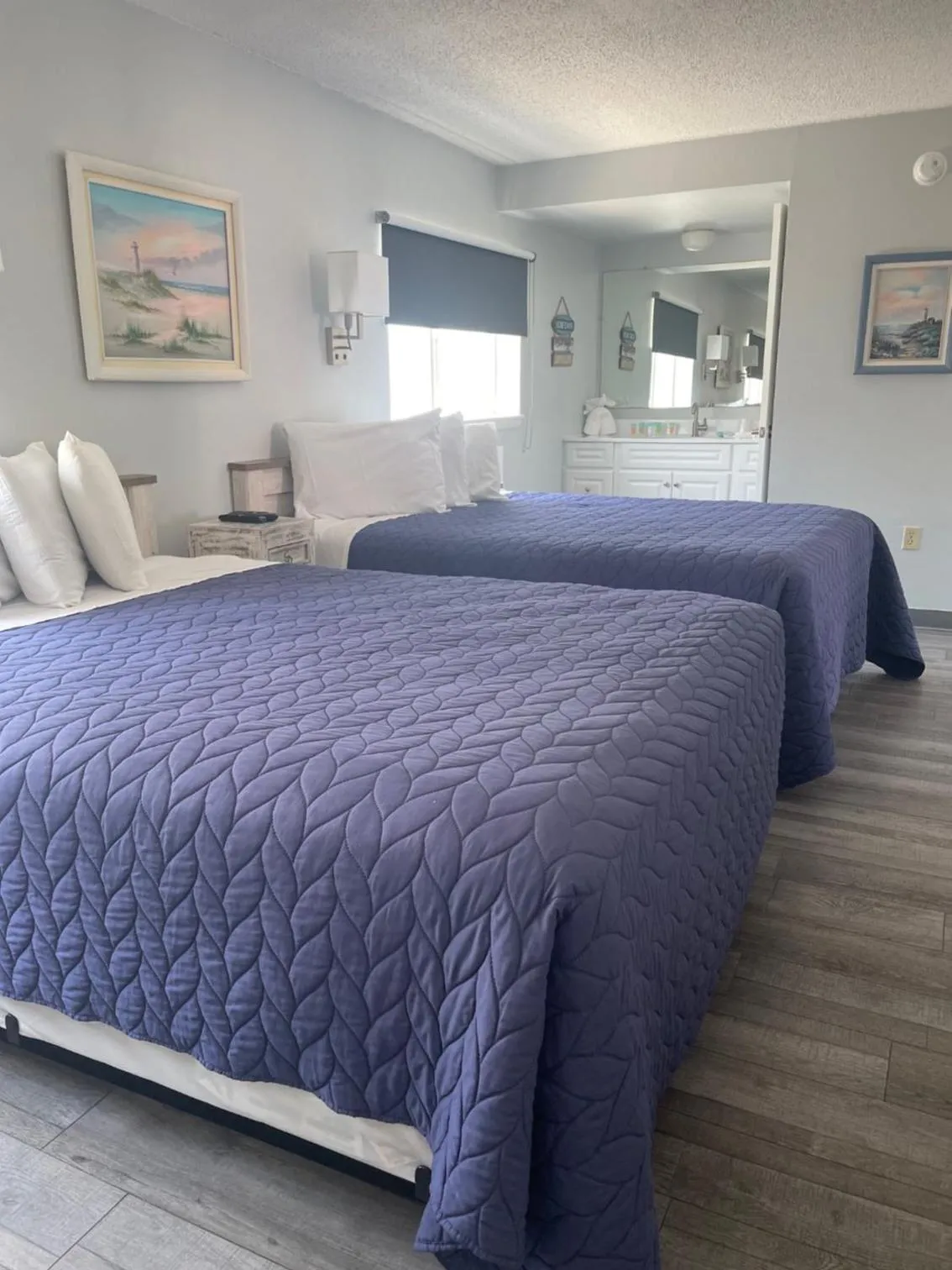 Bed in Acacia Beachfront Resort