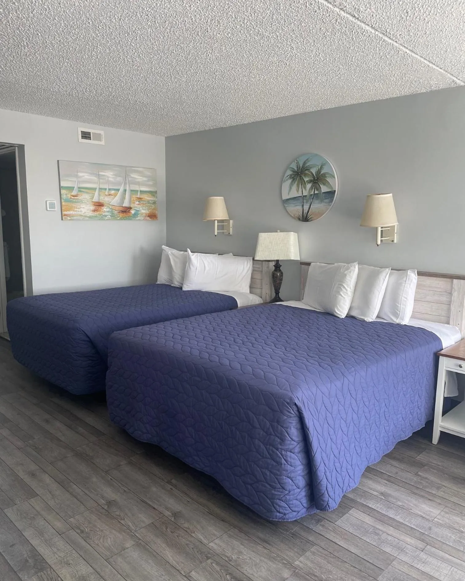 Bed in Acacia Beachfront Resort