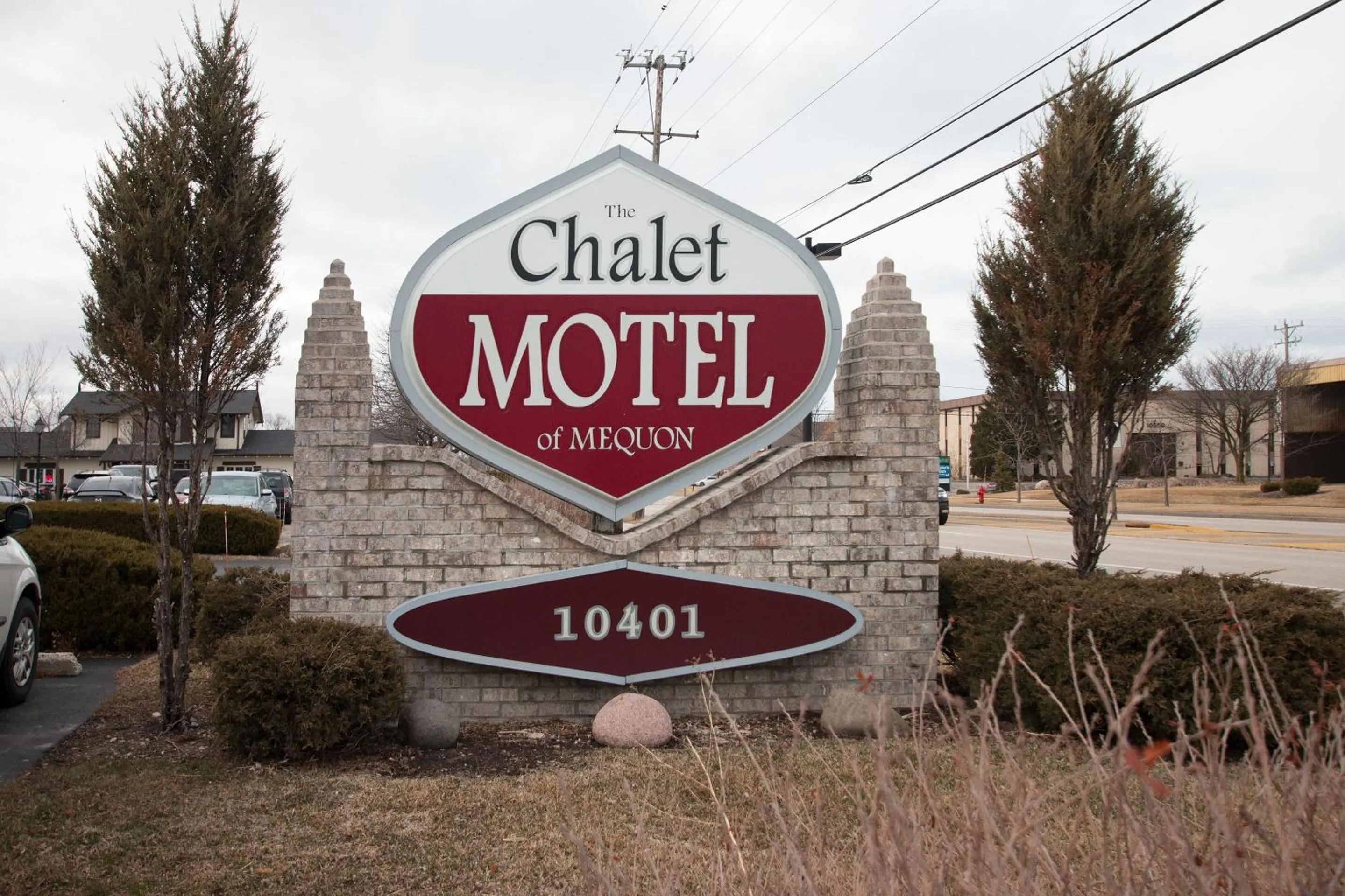 Property logo or sign in The Chalet Motel
