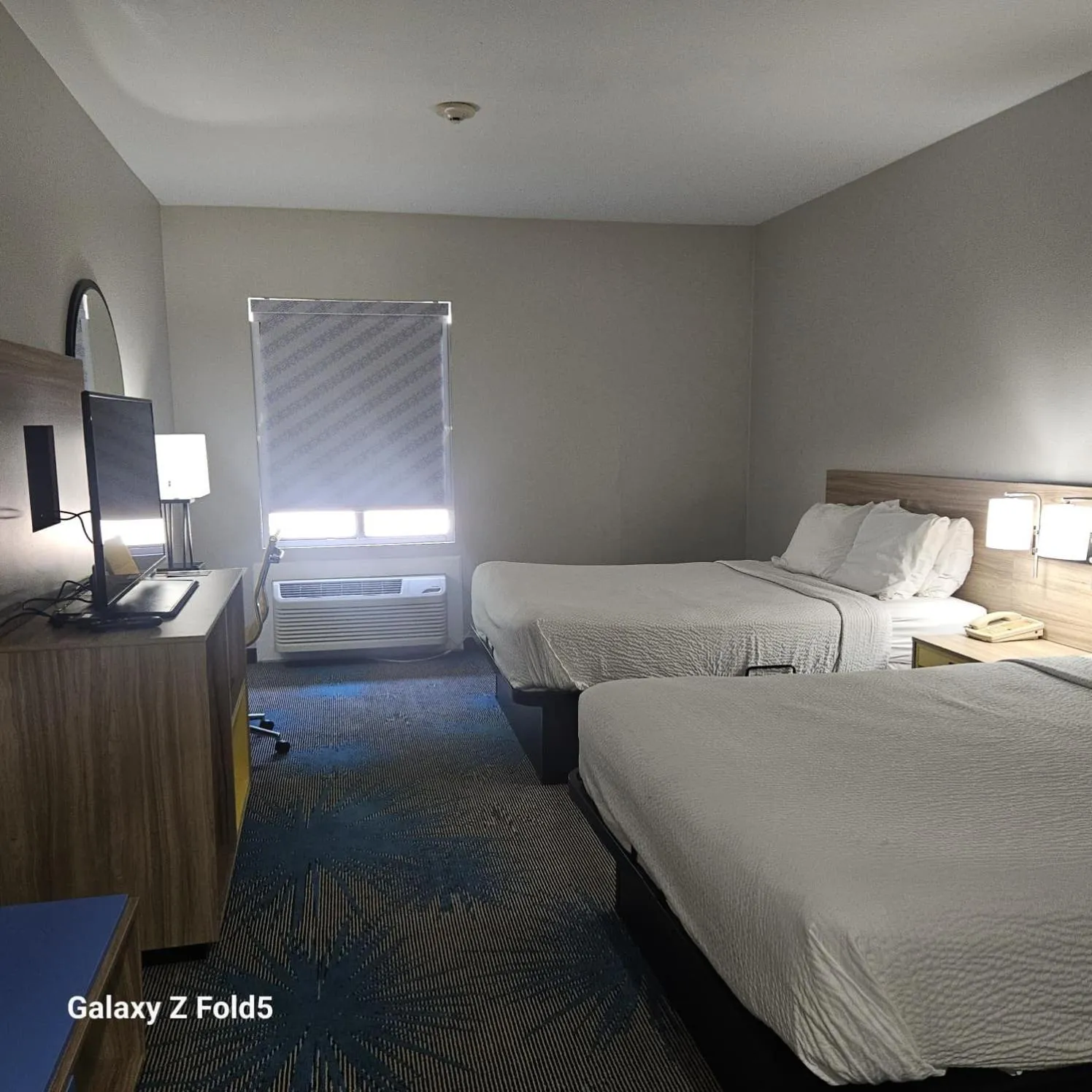 Bed in Days Inn by Wyndham Jefferson City
