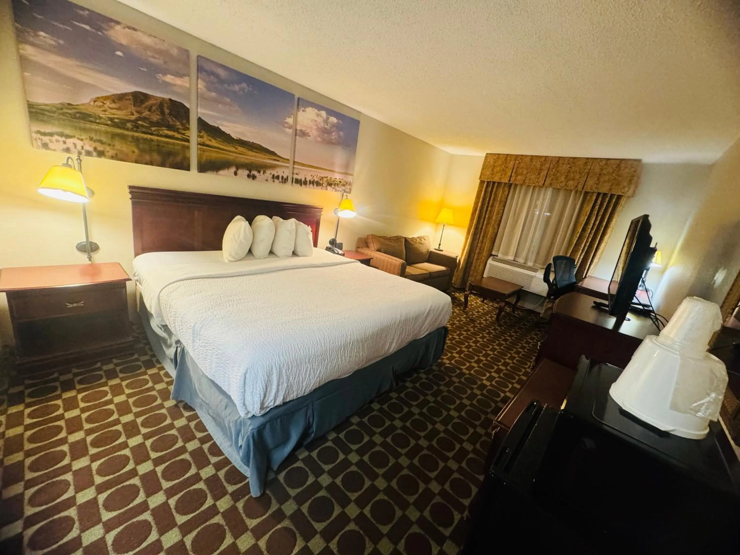 Bedroom, Bed in Days Inn by Wyndham Sturgis