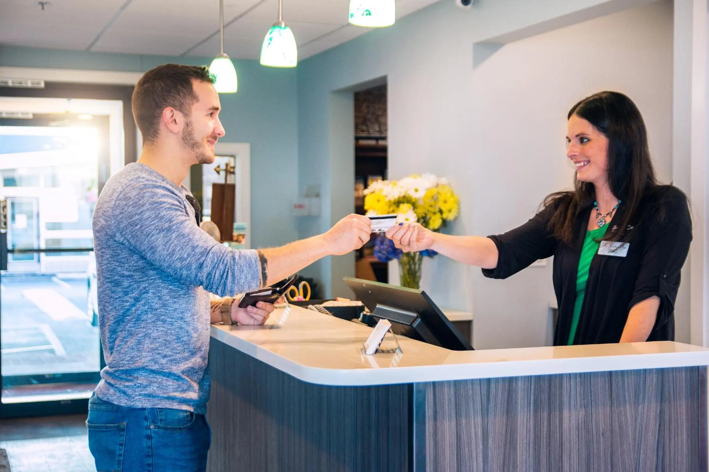 Staff in Seashore Inn on the Beach Seaside